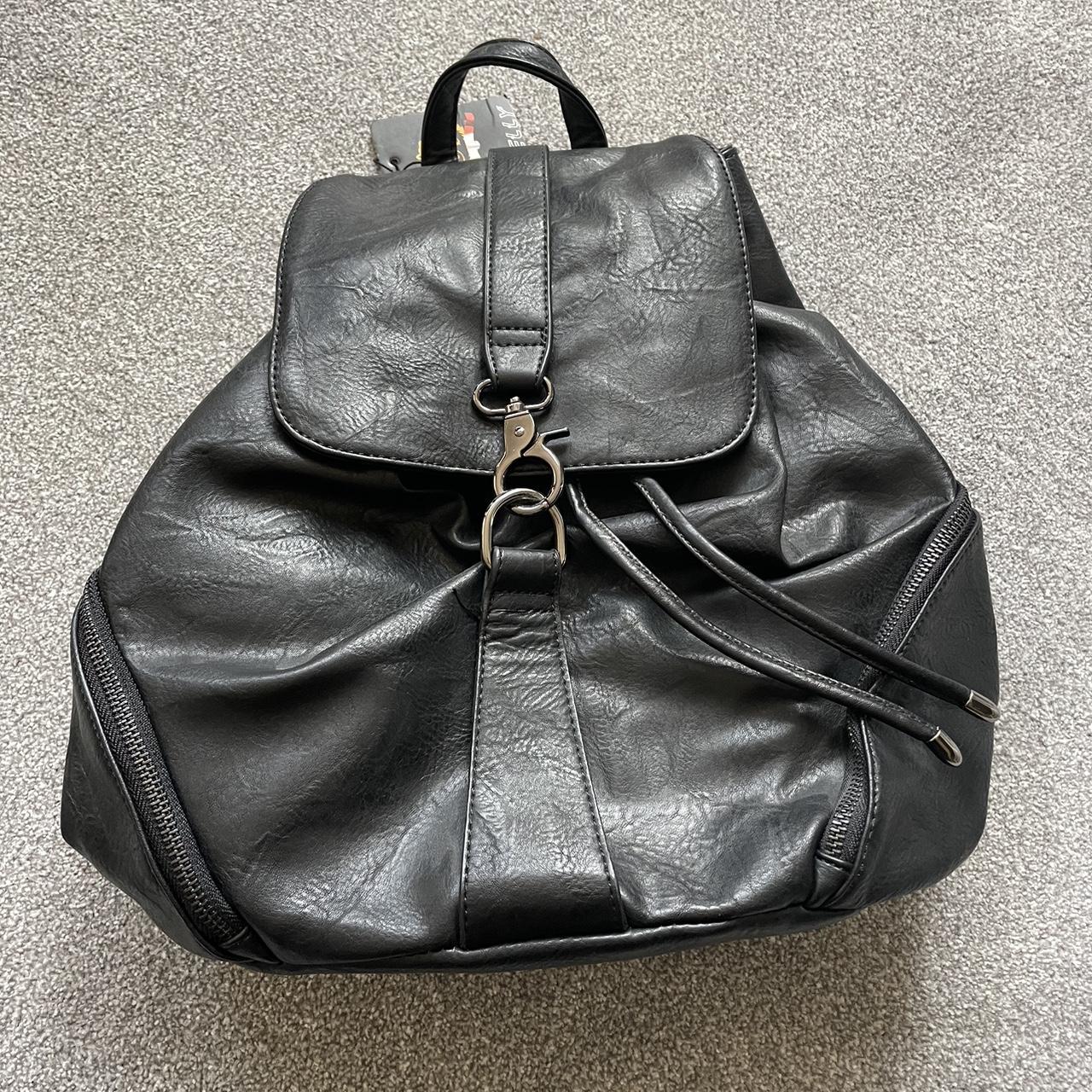 100% Leather rucksack, two side pockets, one back... - Depop