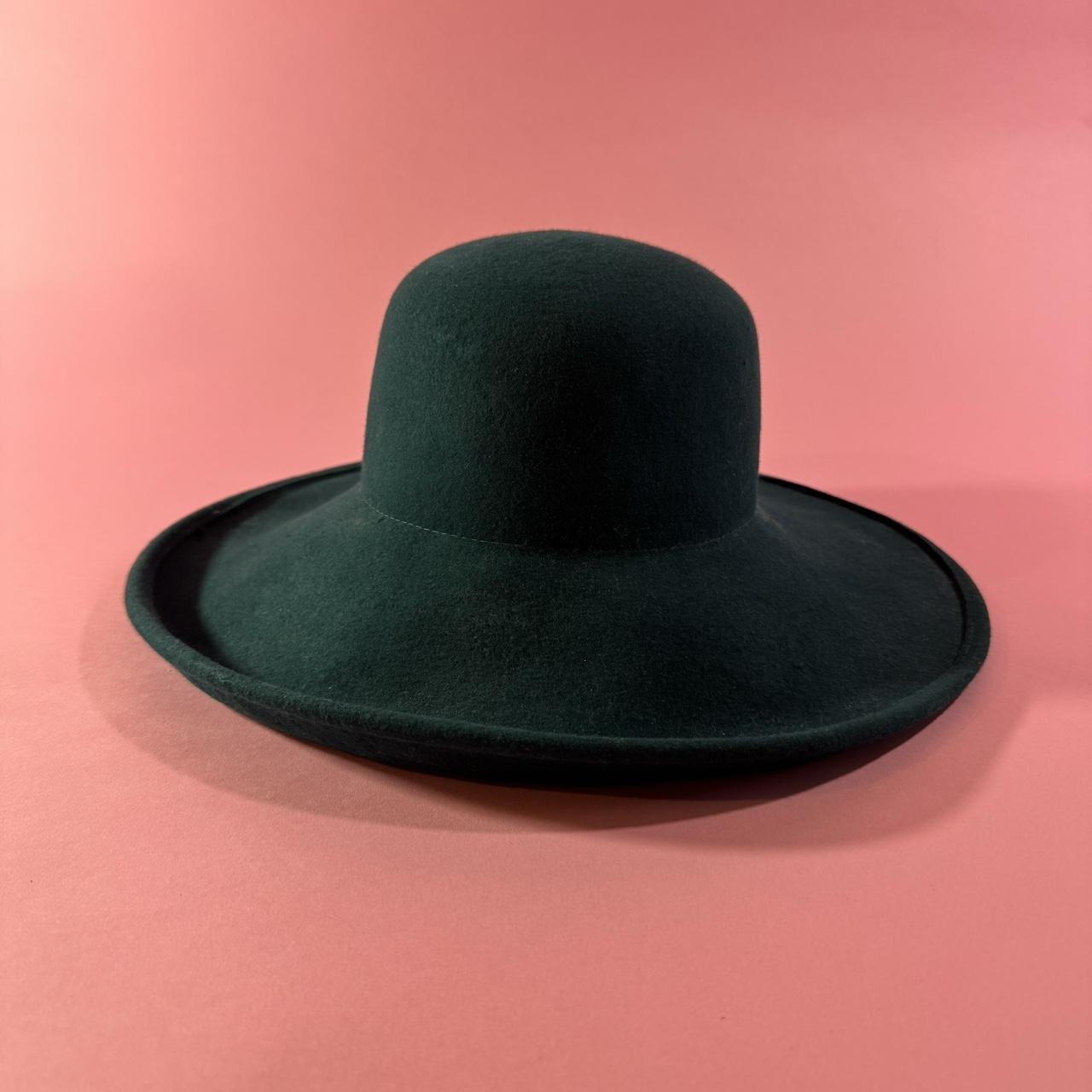 Dark green bowler shops hat