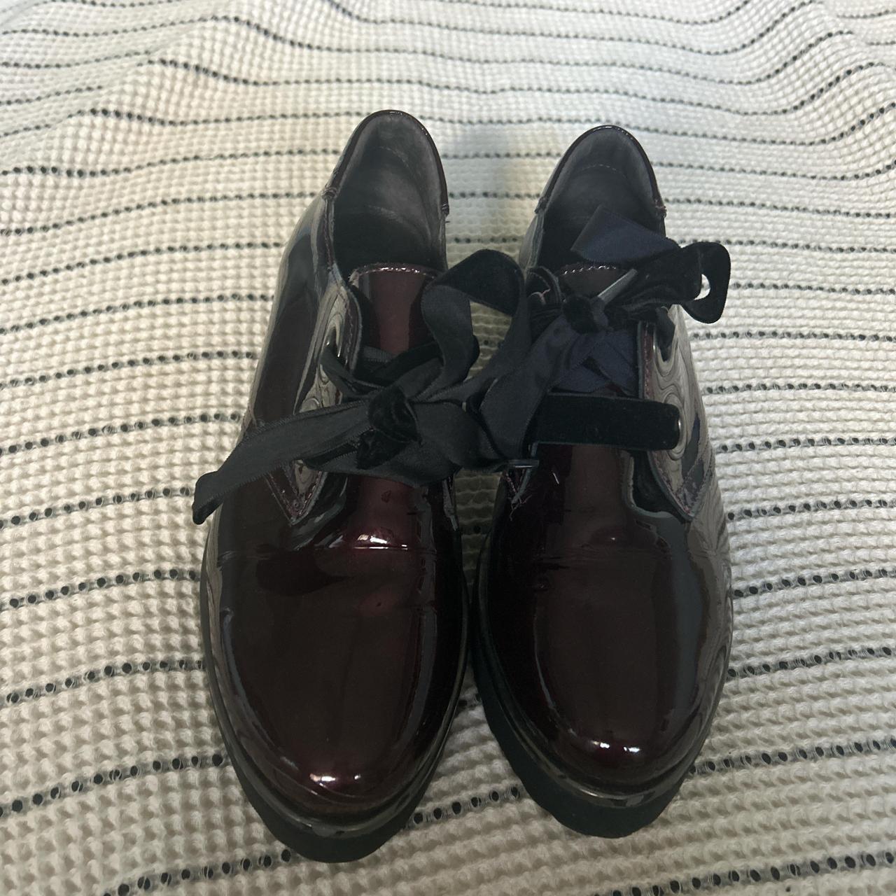 navy patent brogues
