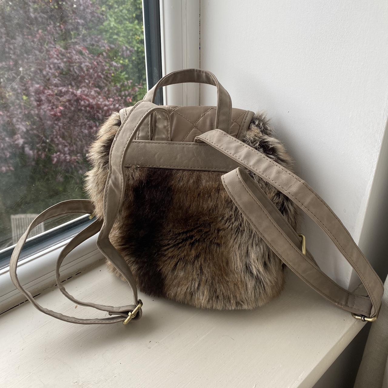 RIVER ISLAND faux fur mini backpack adjustable... Depop