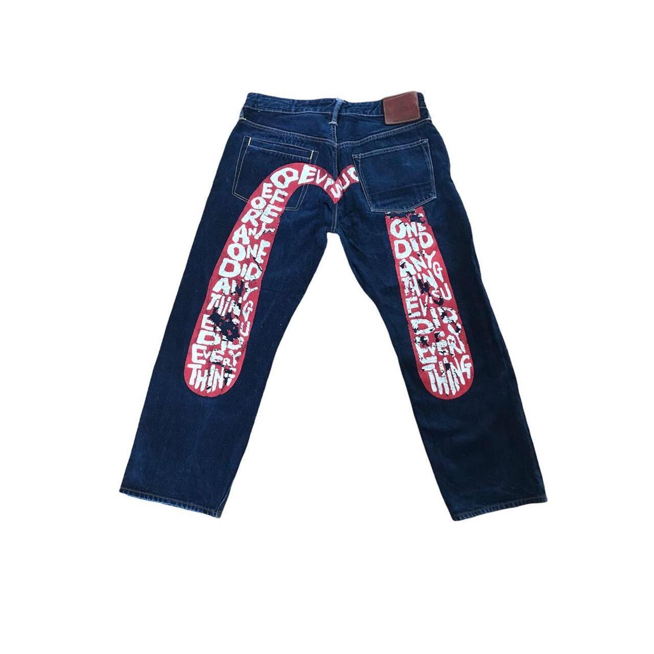 Evisu jeans with red lettering painted daicock... - Depop