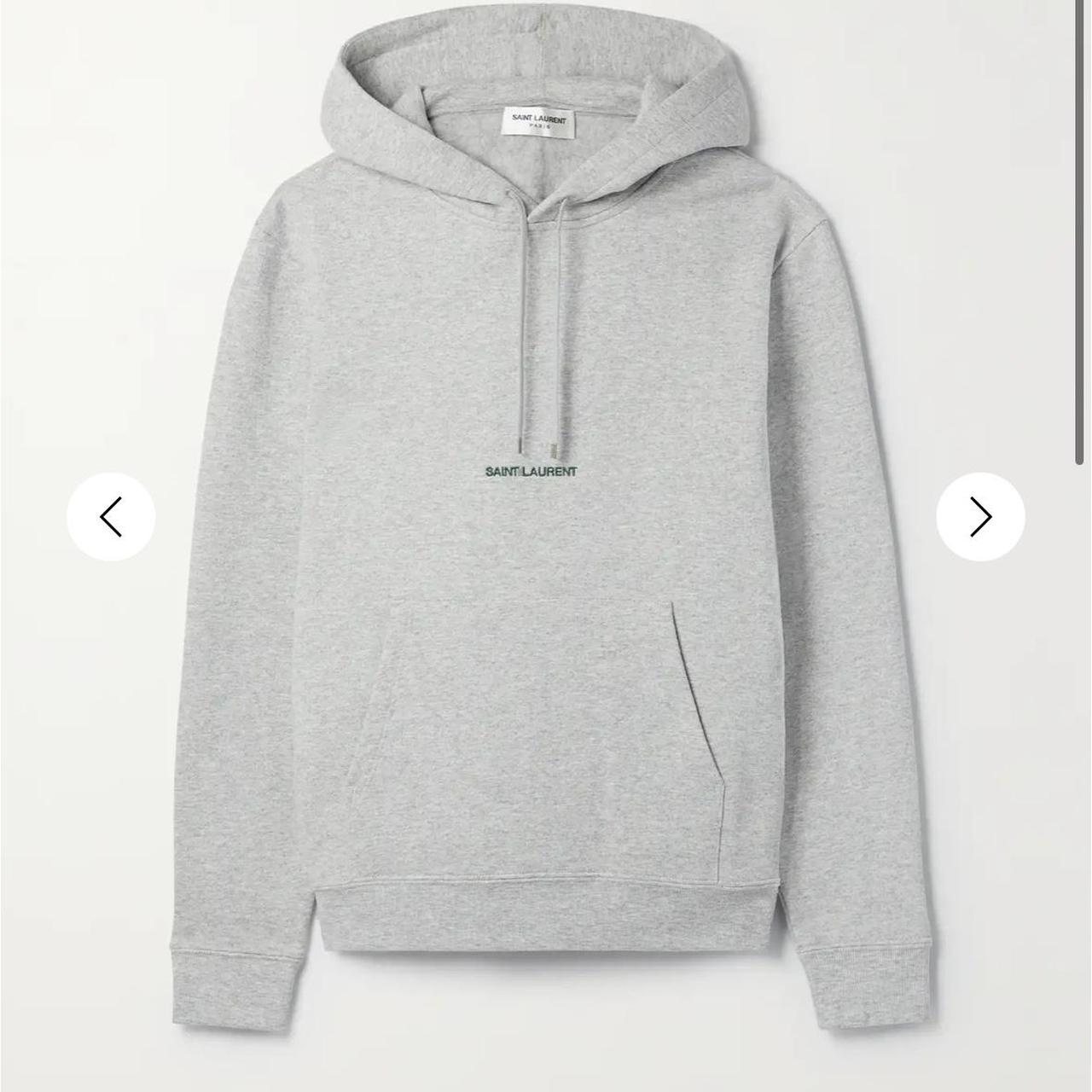 Saint Laurent grey hoodie currently retailing for. Depop