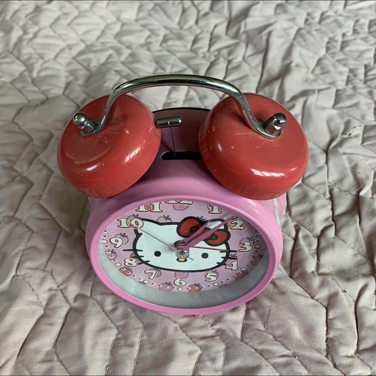 Strawberry Hello kitty alarm clock! Still works but