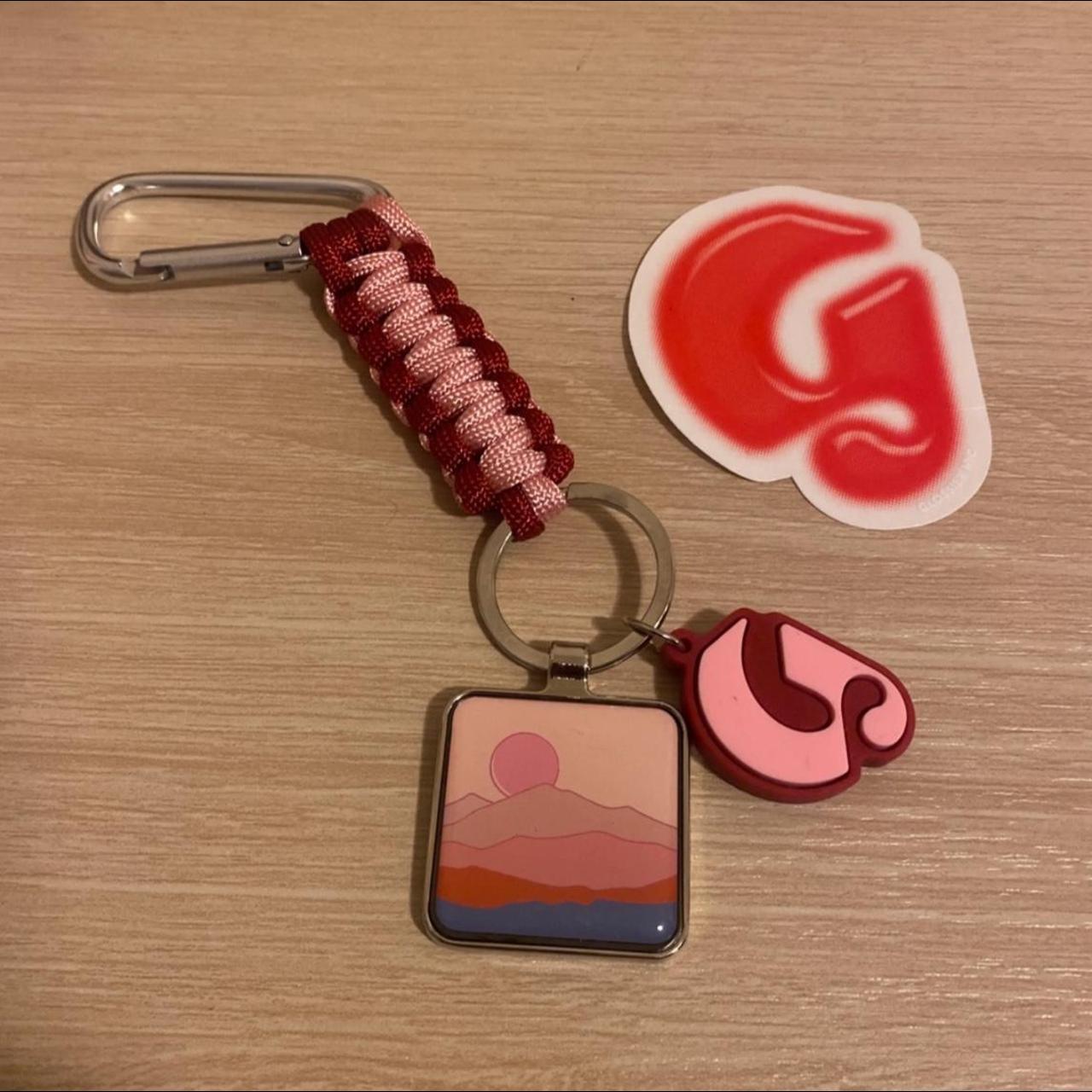 glossier desert keychain, only available in stores.... Depop