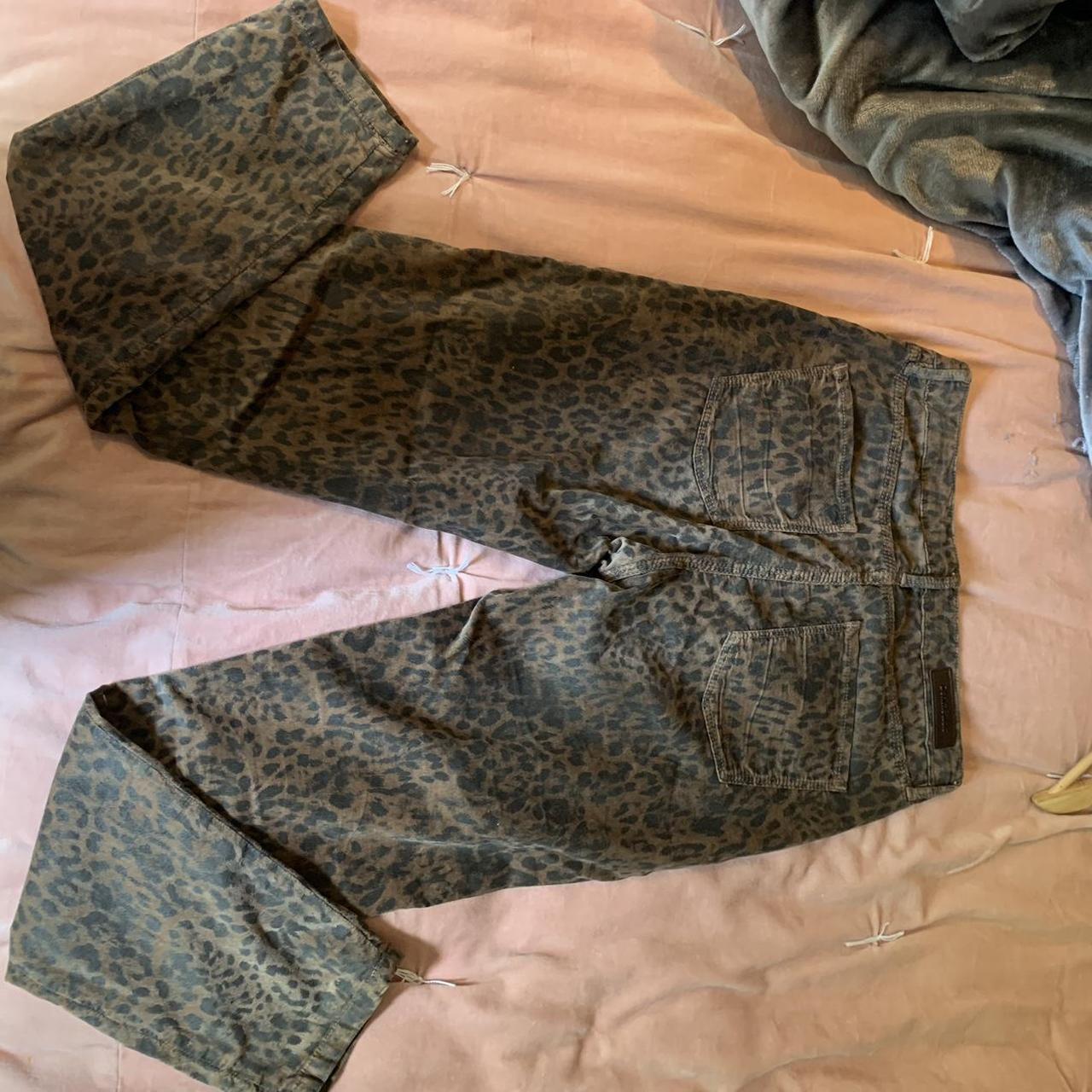 Leopard print low rise jeans in size W27 from... - Depop