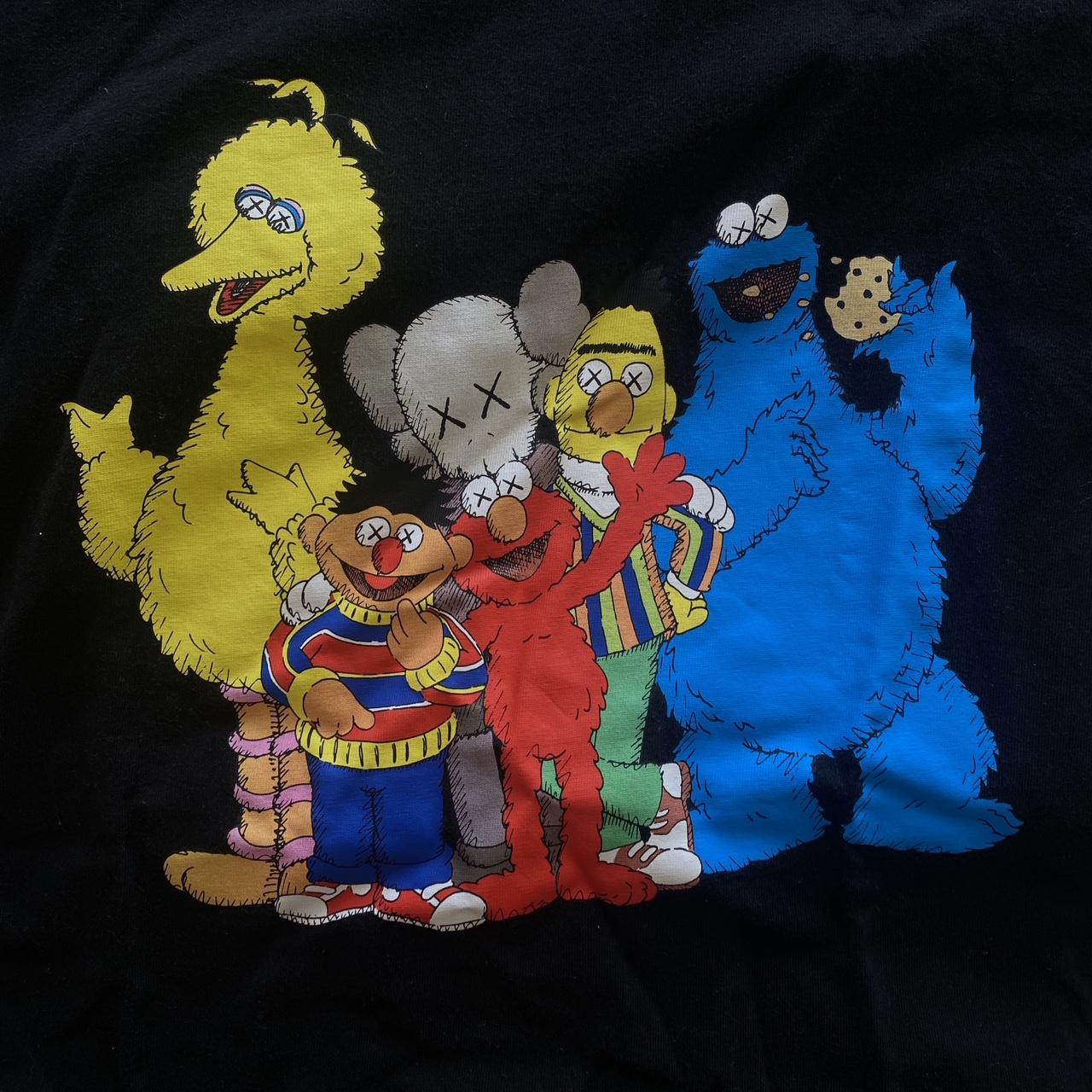 KAWS X Uniqlo X Sesame Street • black t shirt with... - Depop