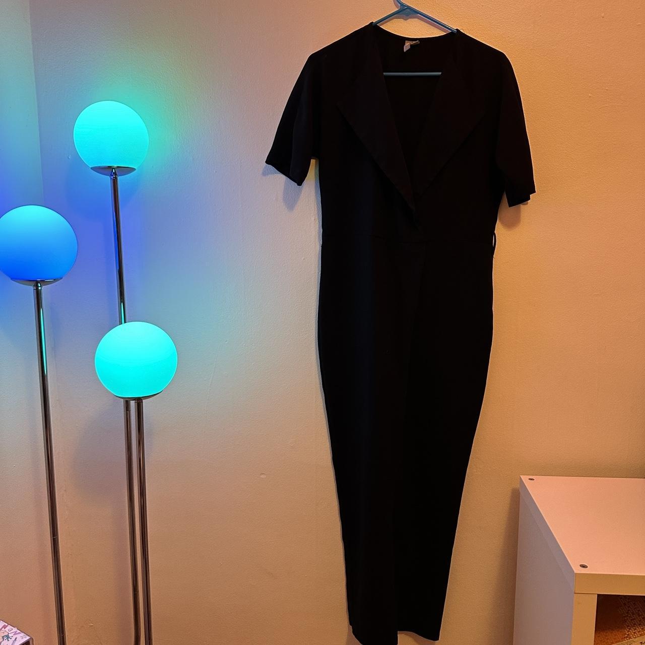 Cute and simple black poly jumpsuit from Asos in... Depop