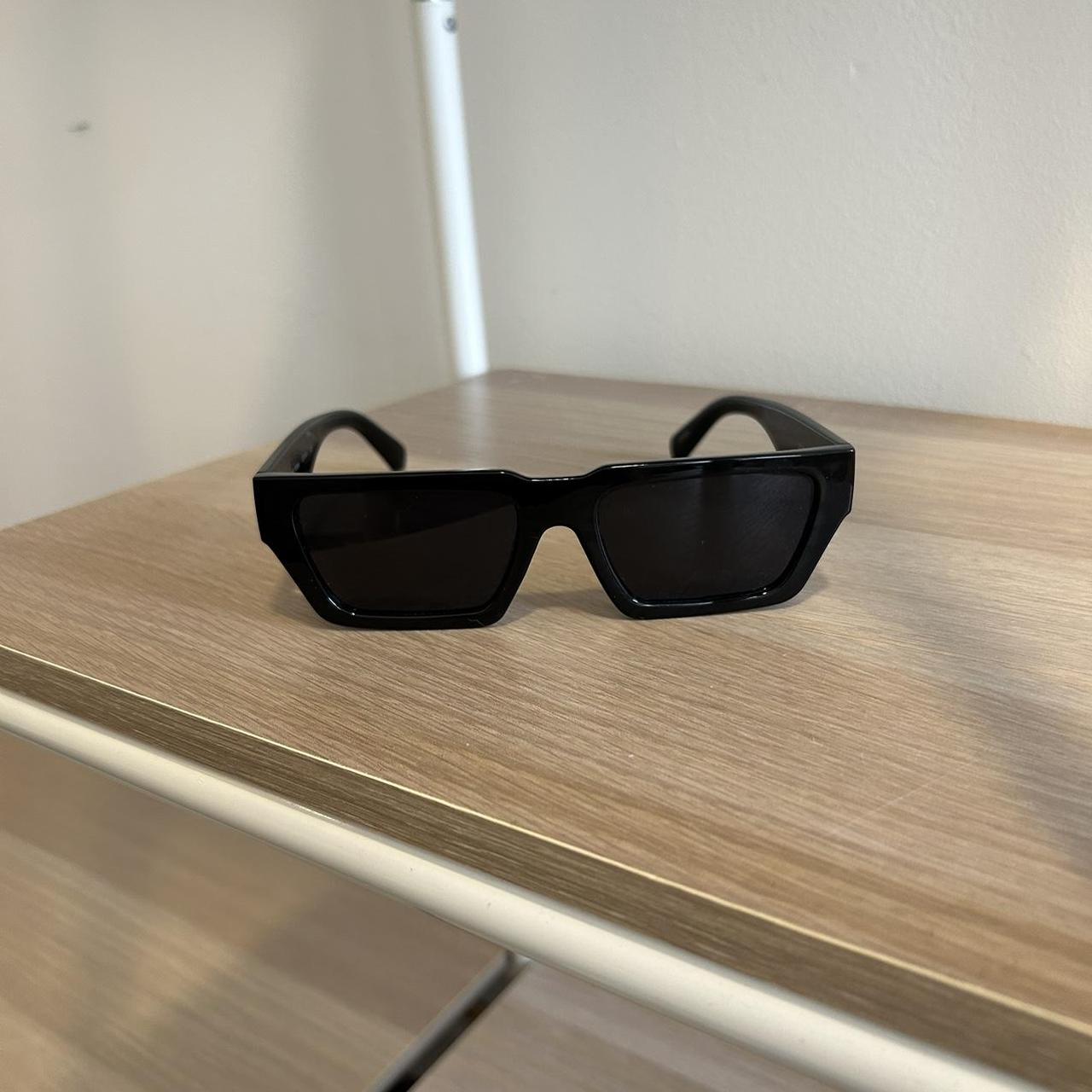 Black chunky fashion sunglasses. Prada dupe.... Depop