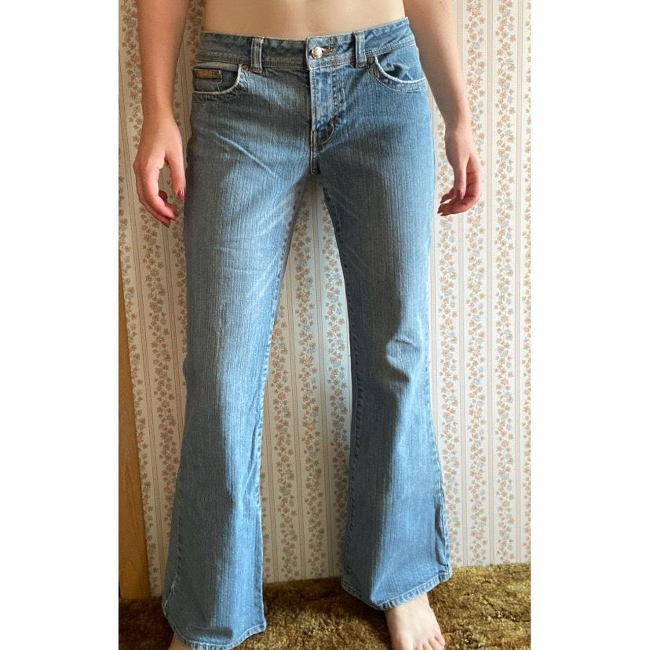 Light blue flare jeans. Light stains on right front... - Depop