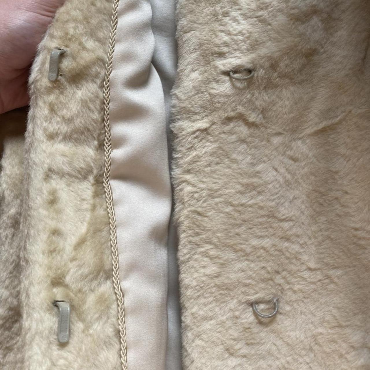 Cream/yellowish fur coat. Has unique hook closures.... - Depop