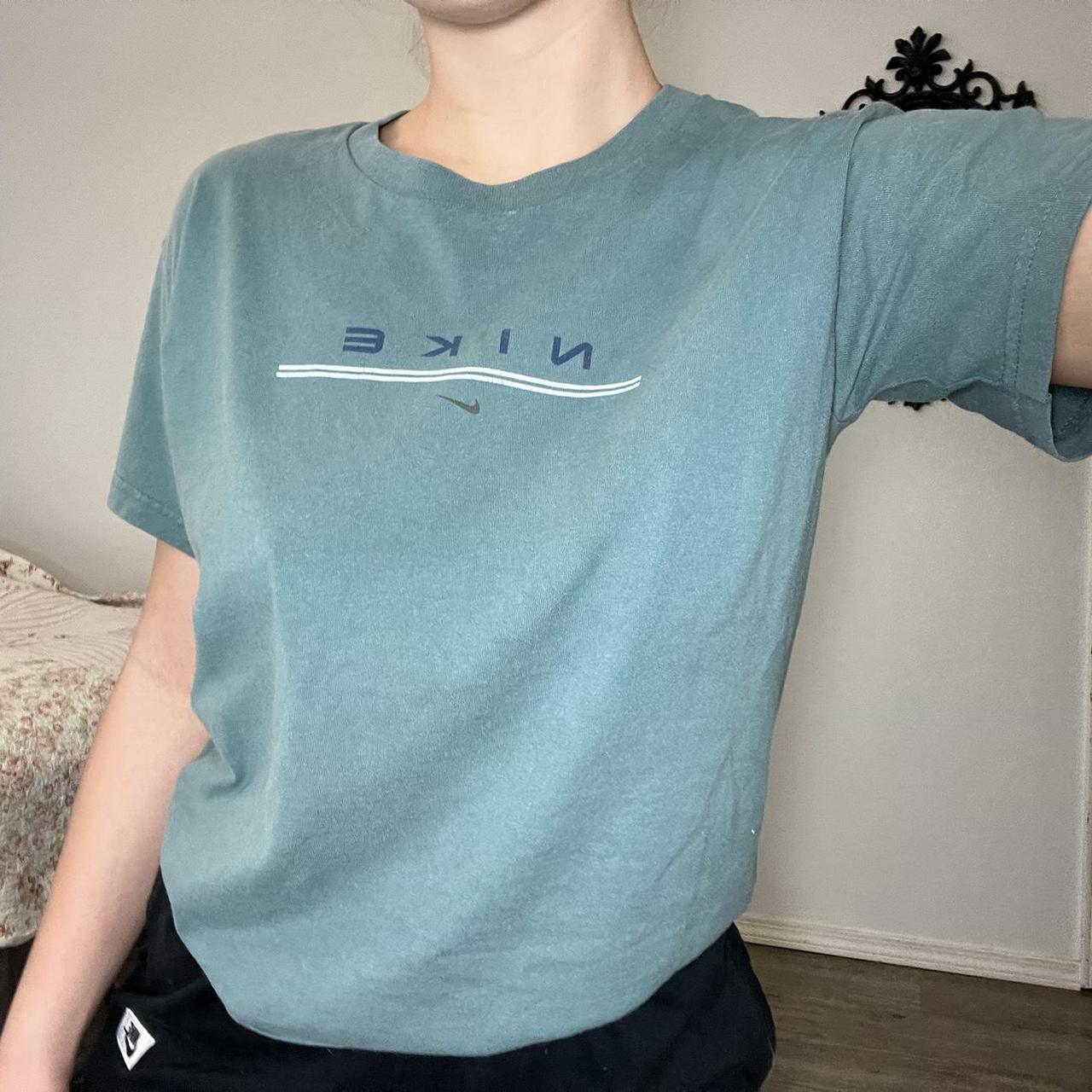 barely green nike shirt
