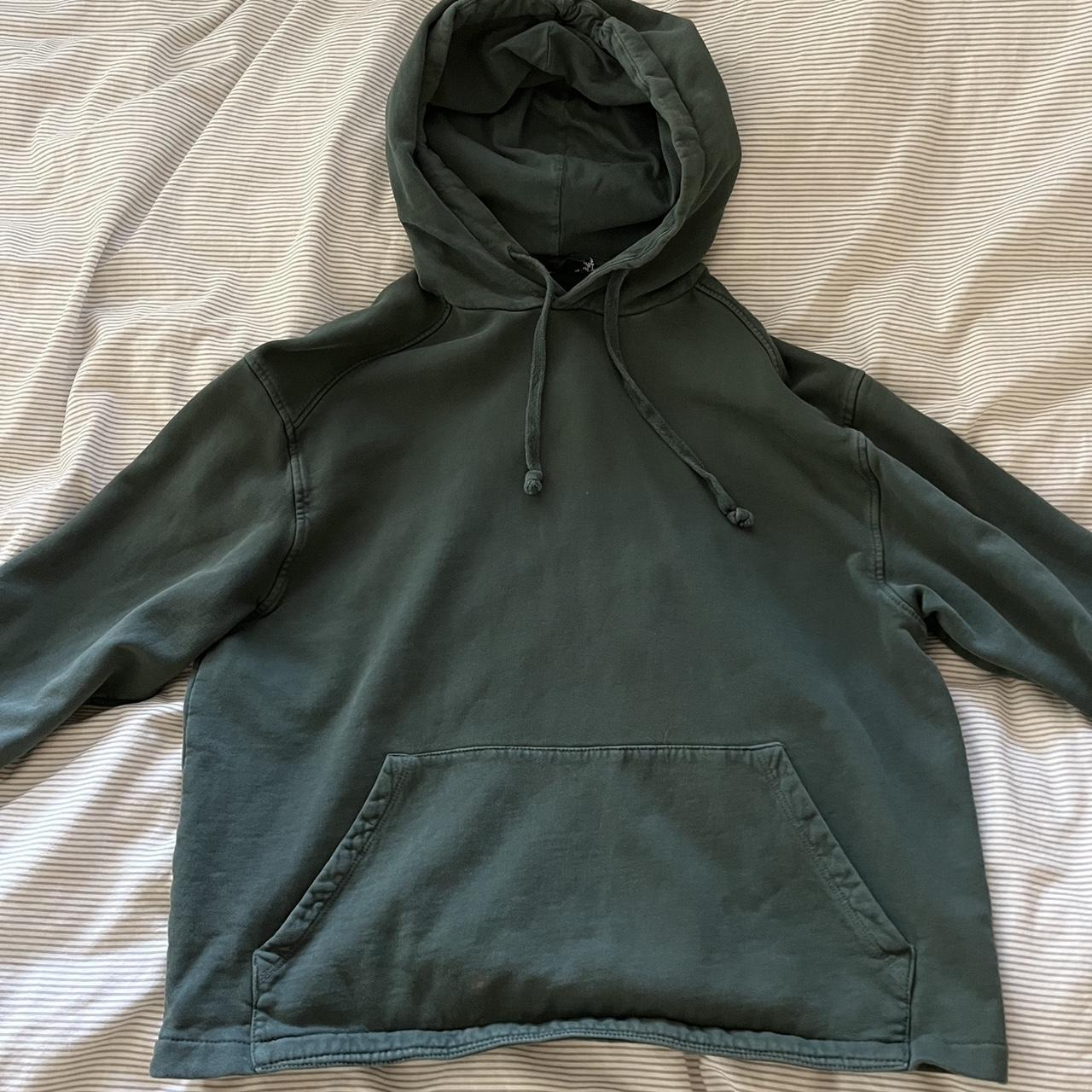 dark green plain hoodie with small red paint stains... - Depop