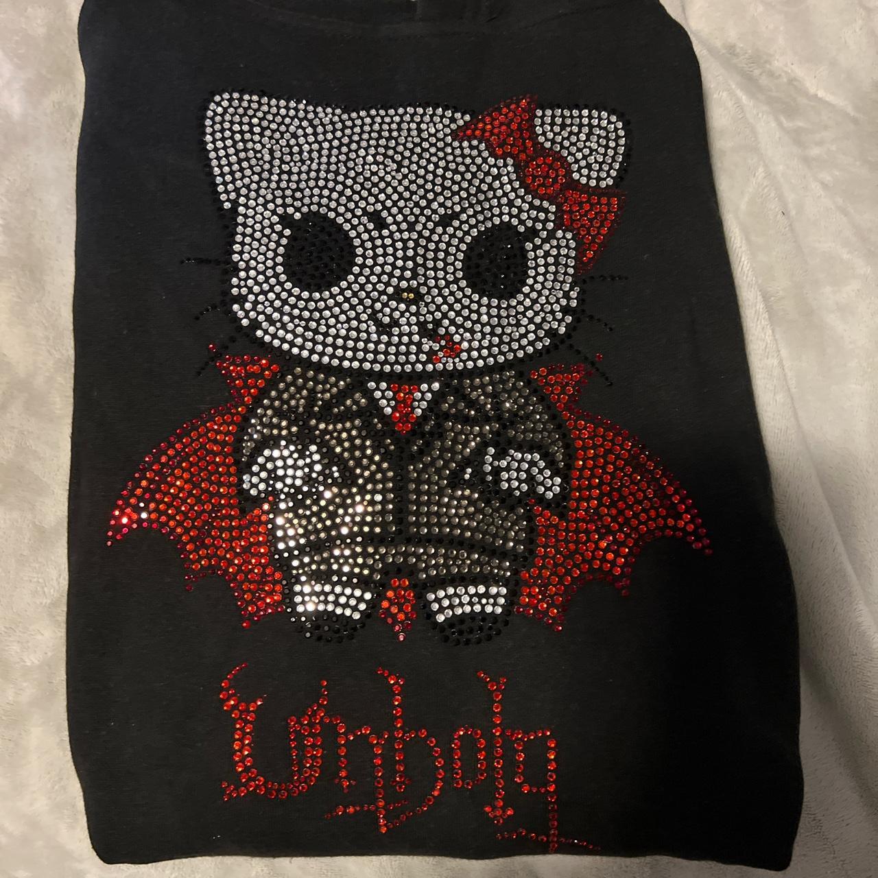 Hello Kitty black waterproof vinyl wraparound - Depop