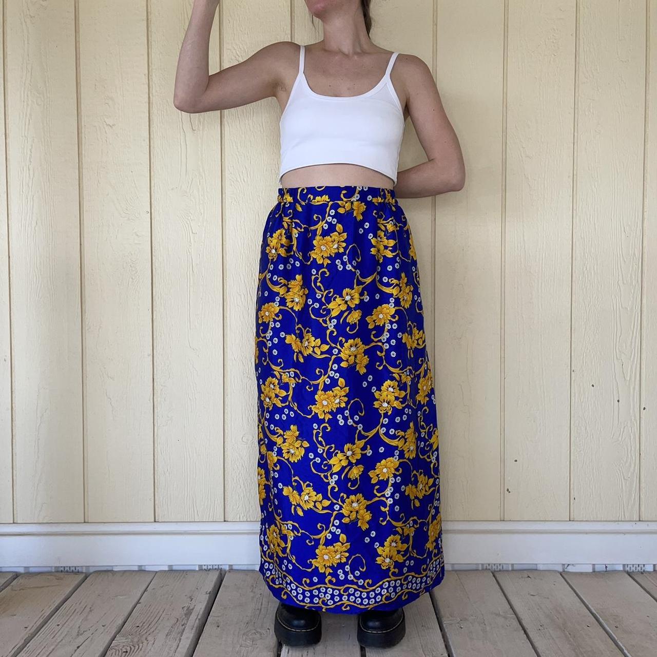 Royal blue skirt and golden outlet top