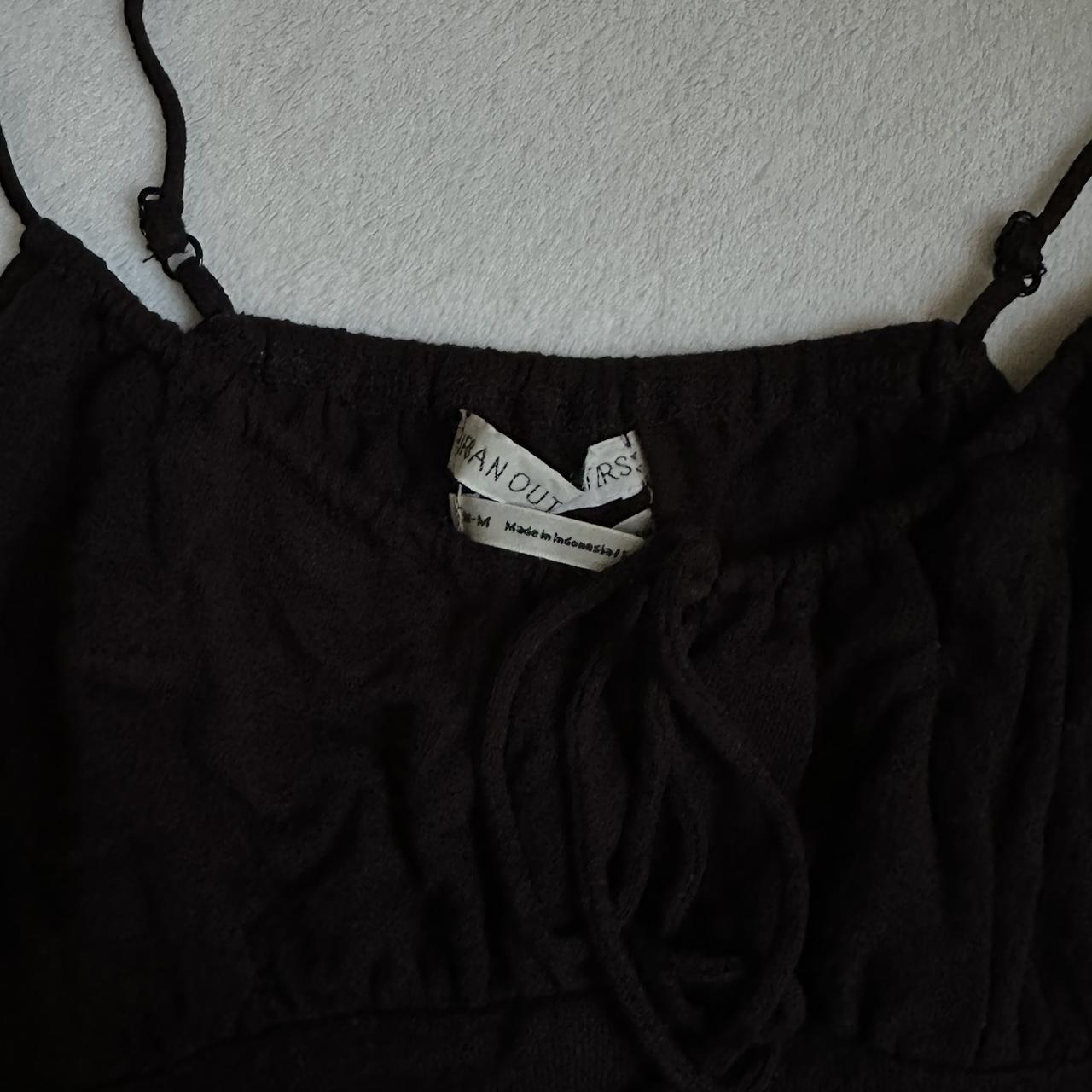 urban outfitter black top tag says size m but fits... Depop