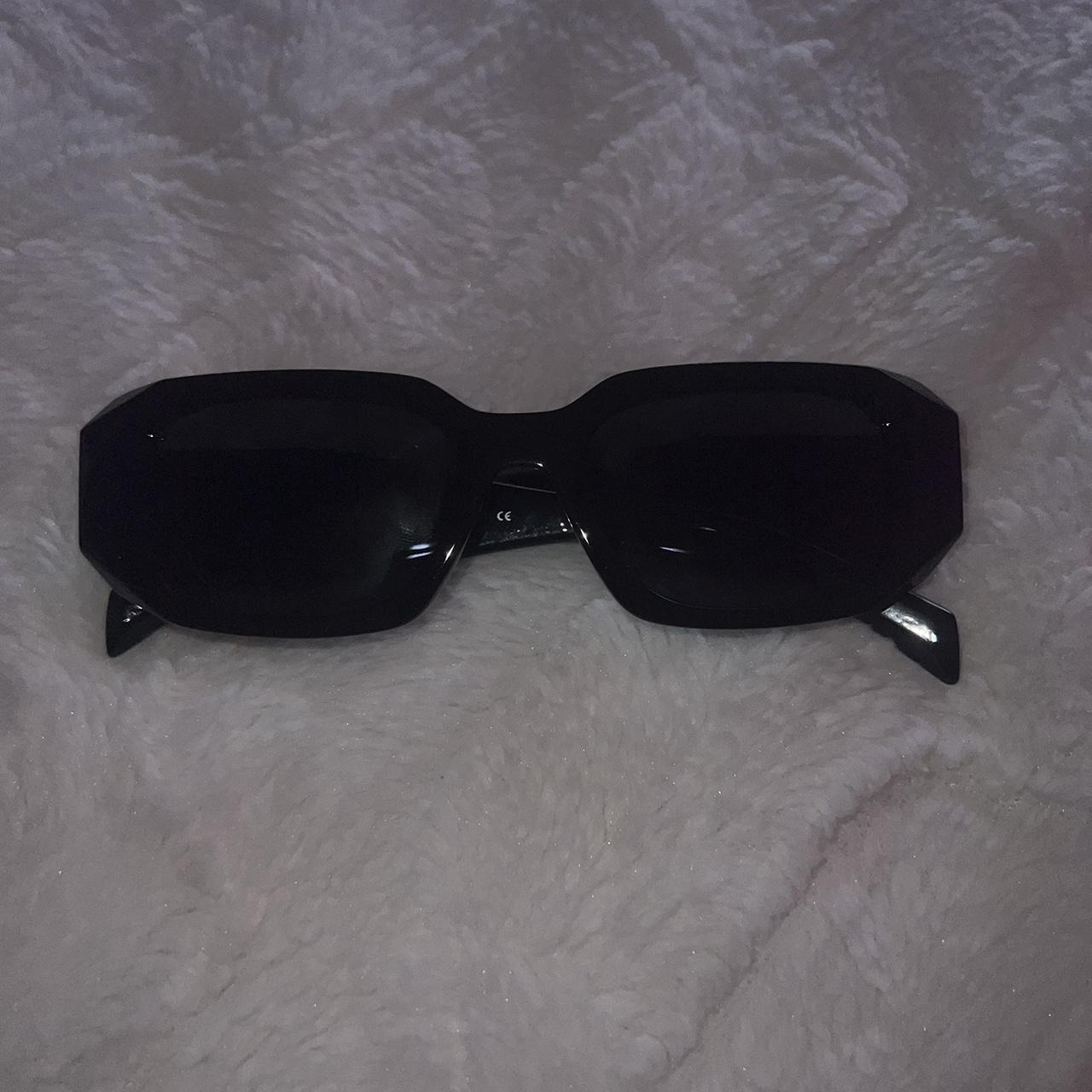 Prada Women's Black Sunglasses | Depop