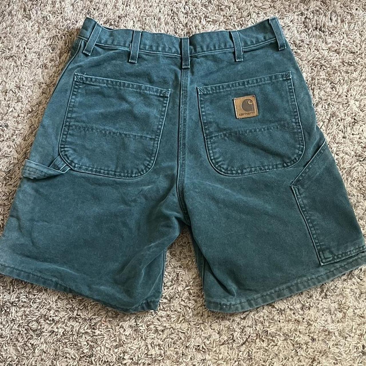 green carhartt cargo shorts size 32 shorts have a... Depop