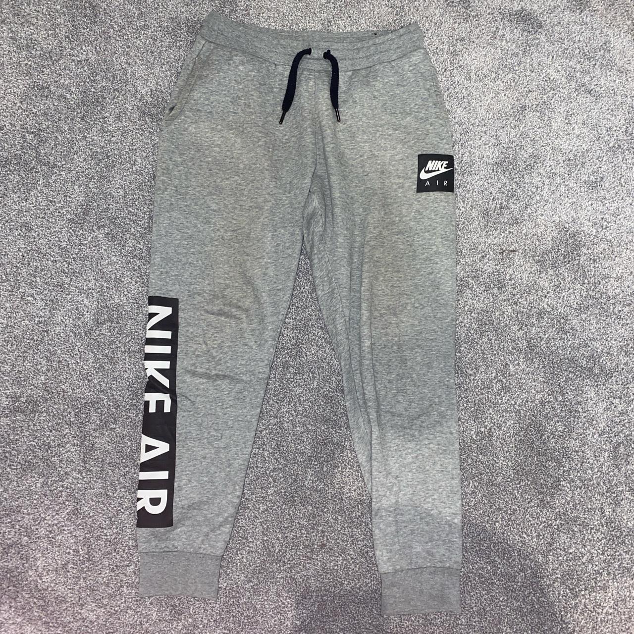 - Grey Nike tracksuit with “Nike air” running down... - Depop