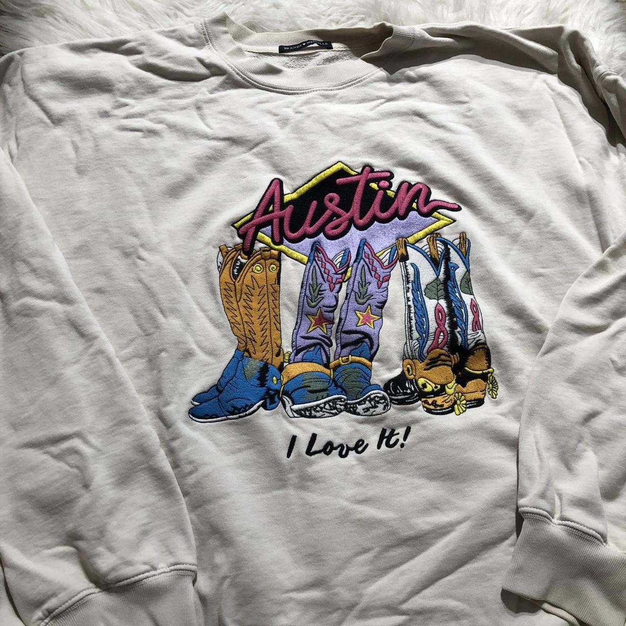 Brandy Melville Austin embroidered sweatshirt. Stain... Depop