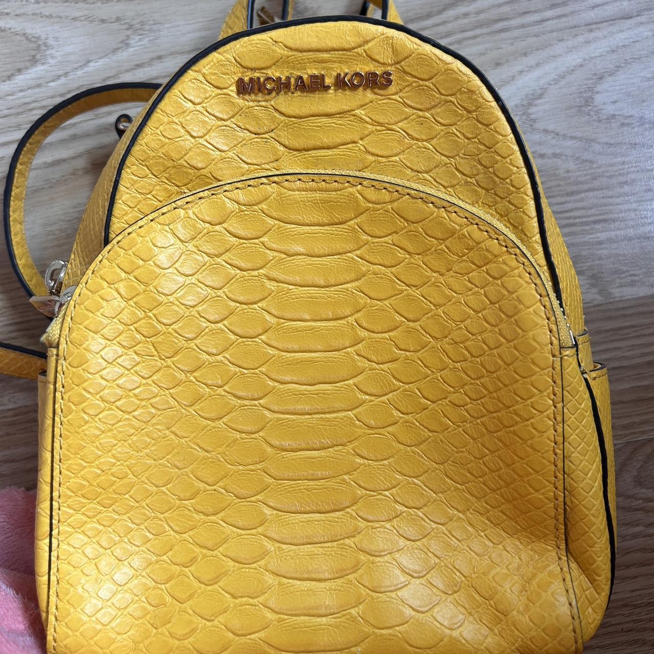 Michael kors deals yellow backpack