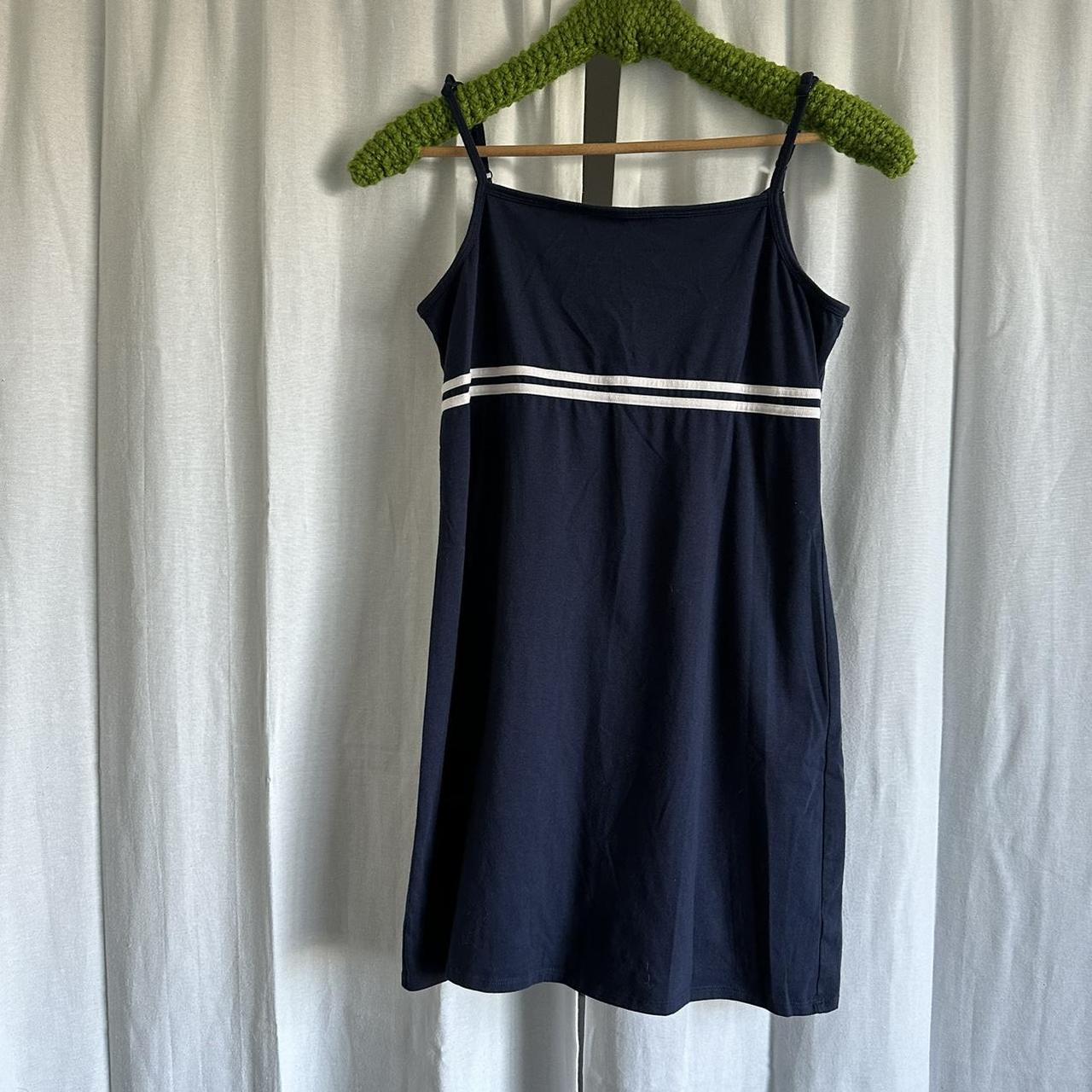 Here is a v cute tennis dress. Throw on some spandex - Depop