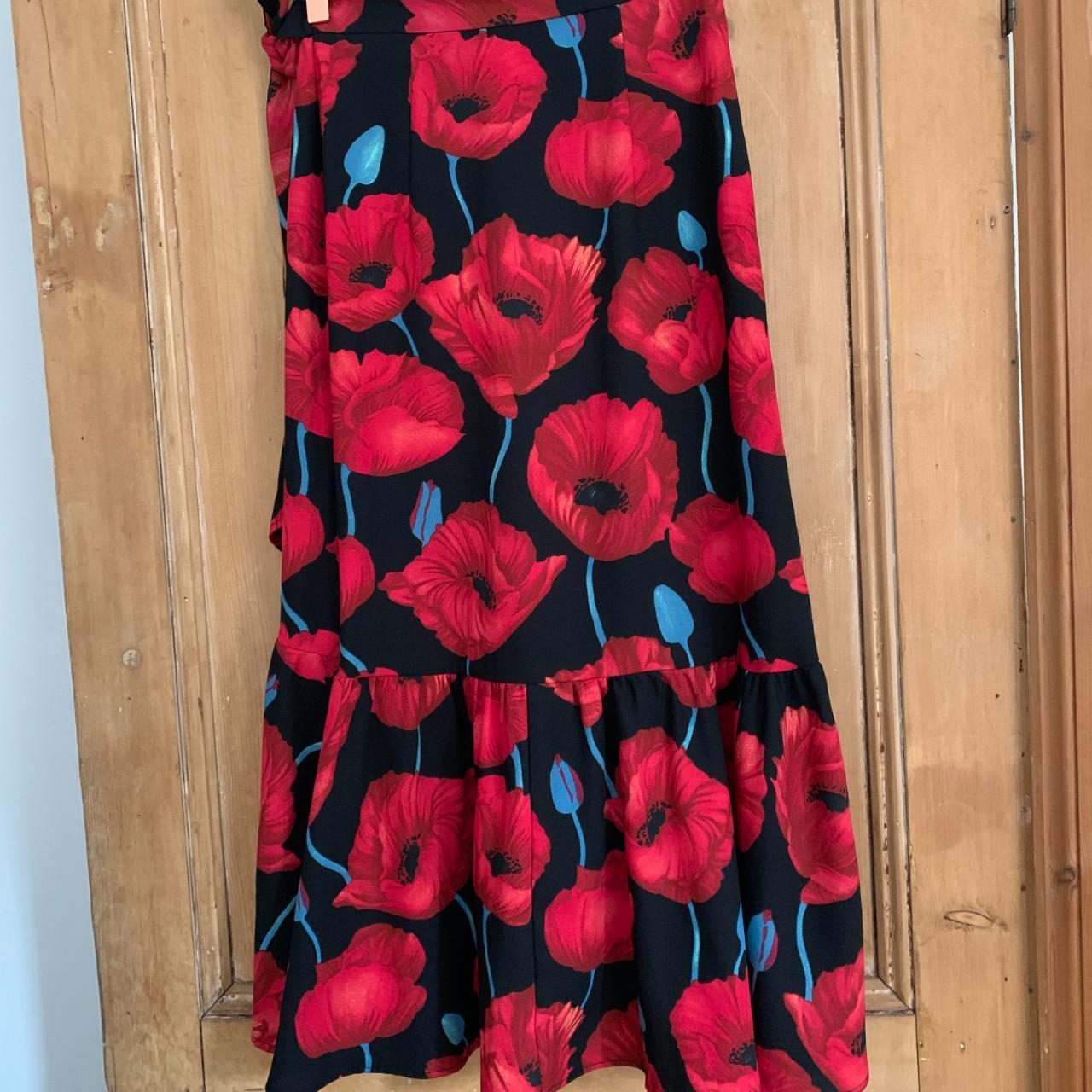 H&M Wrap around black and red floral print skirt... Depop