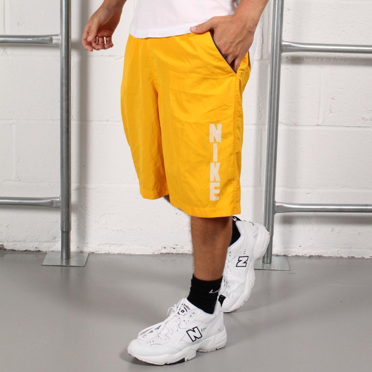 mens nike shorts yellow