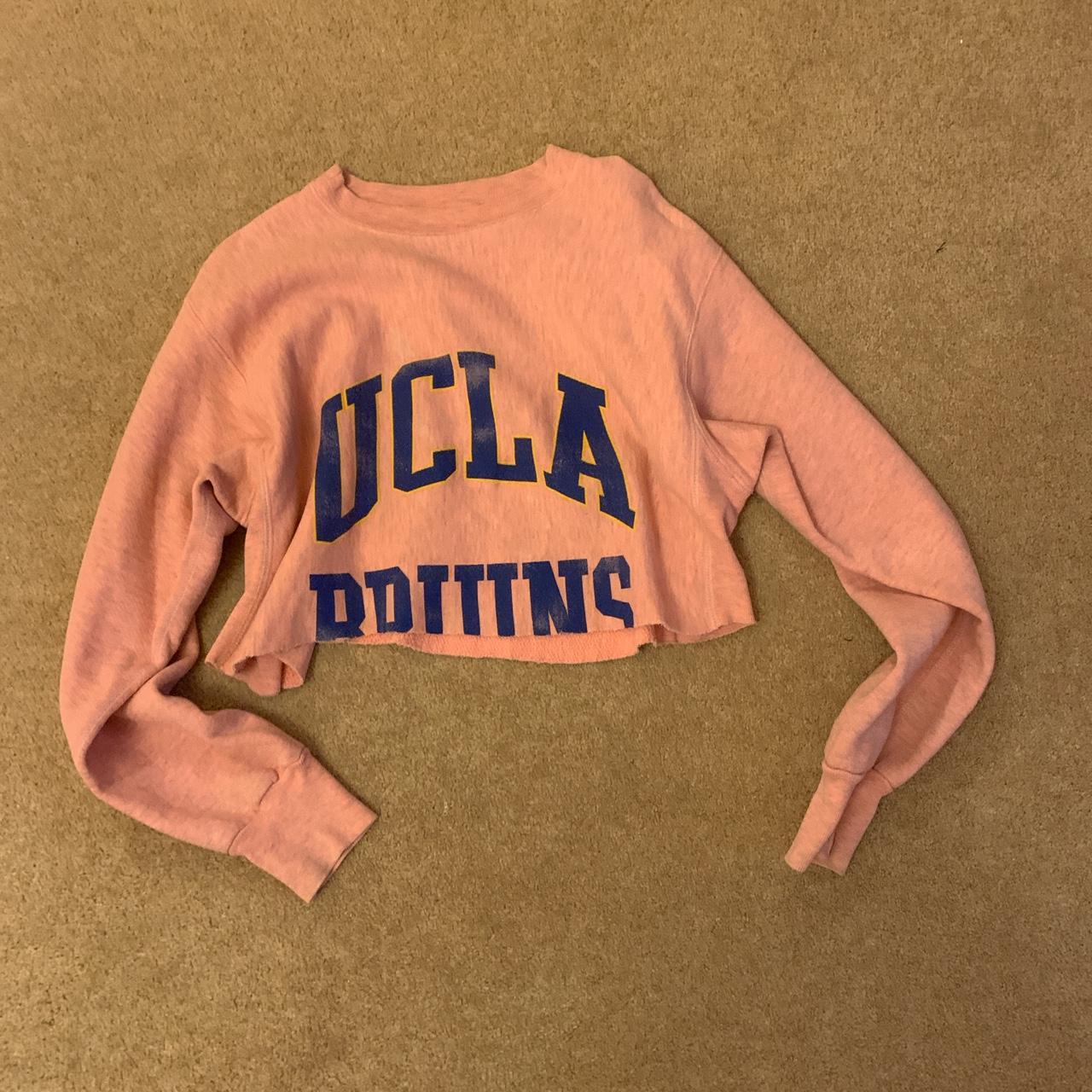Cropped UCLA crew neck hoodie in pink, with navy and... Depop