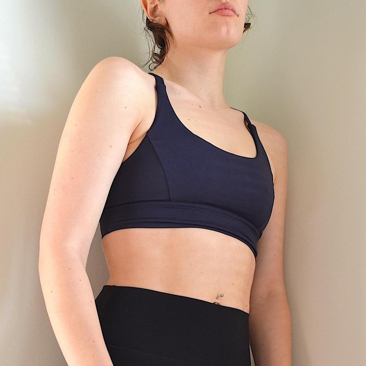 navy blue sports bra from lululemon , labeled size 6