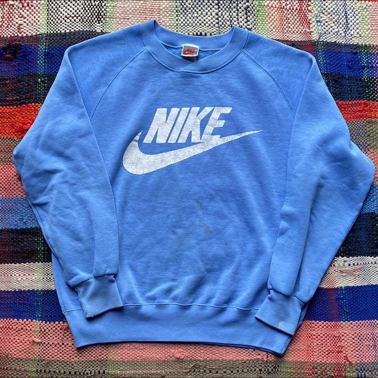 Vintage Nike Blue Sweatshirt Length 24 Width... Depop