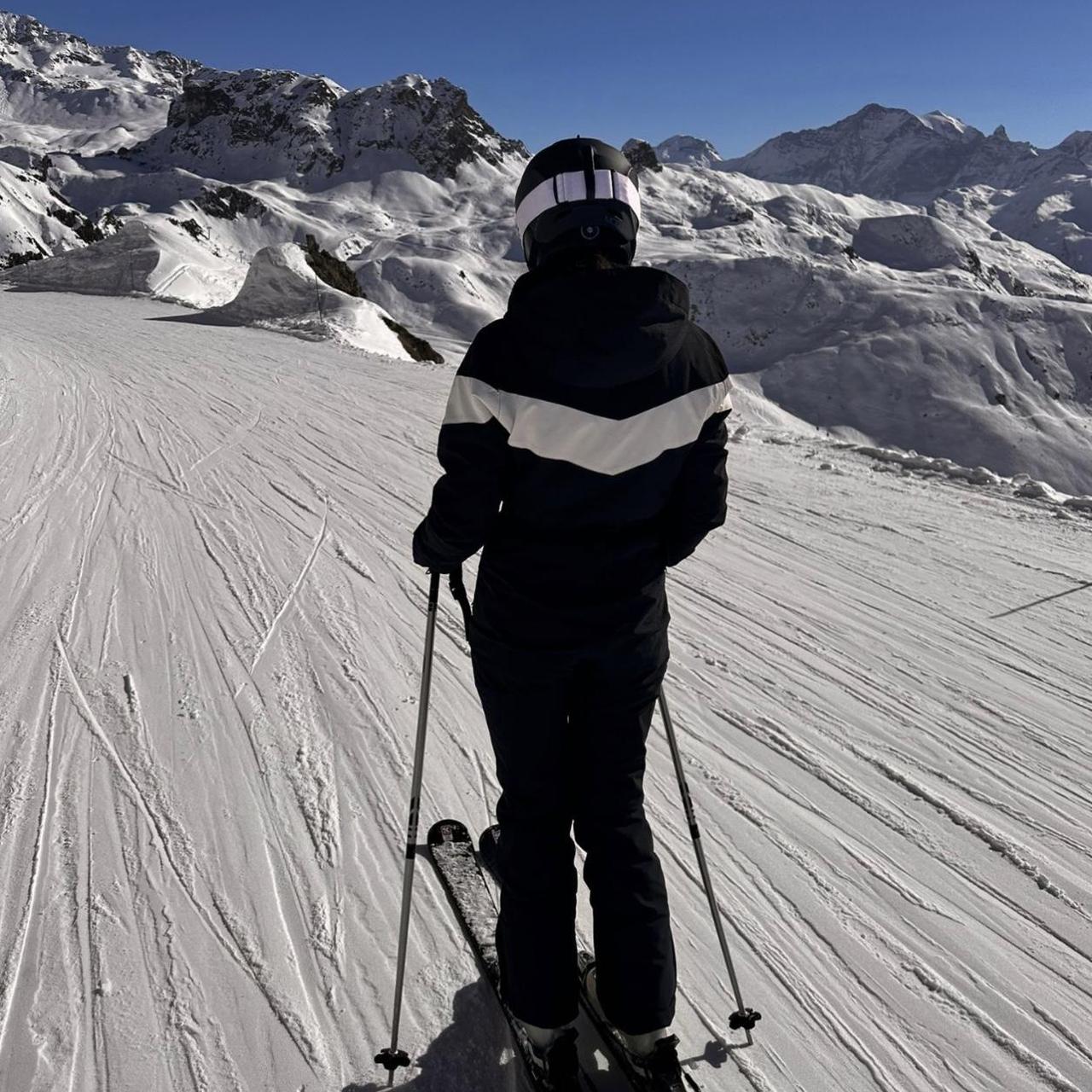 Protest Retro ski suit in black with white stripe