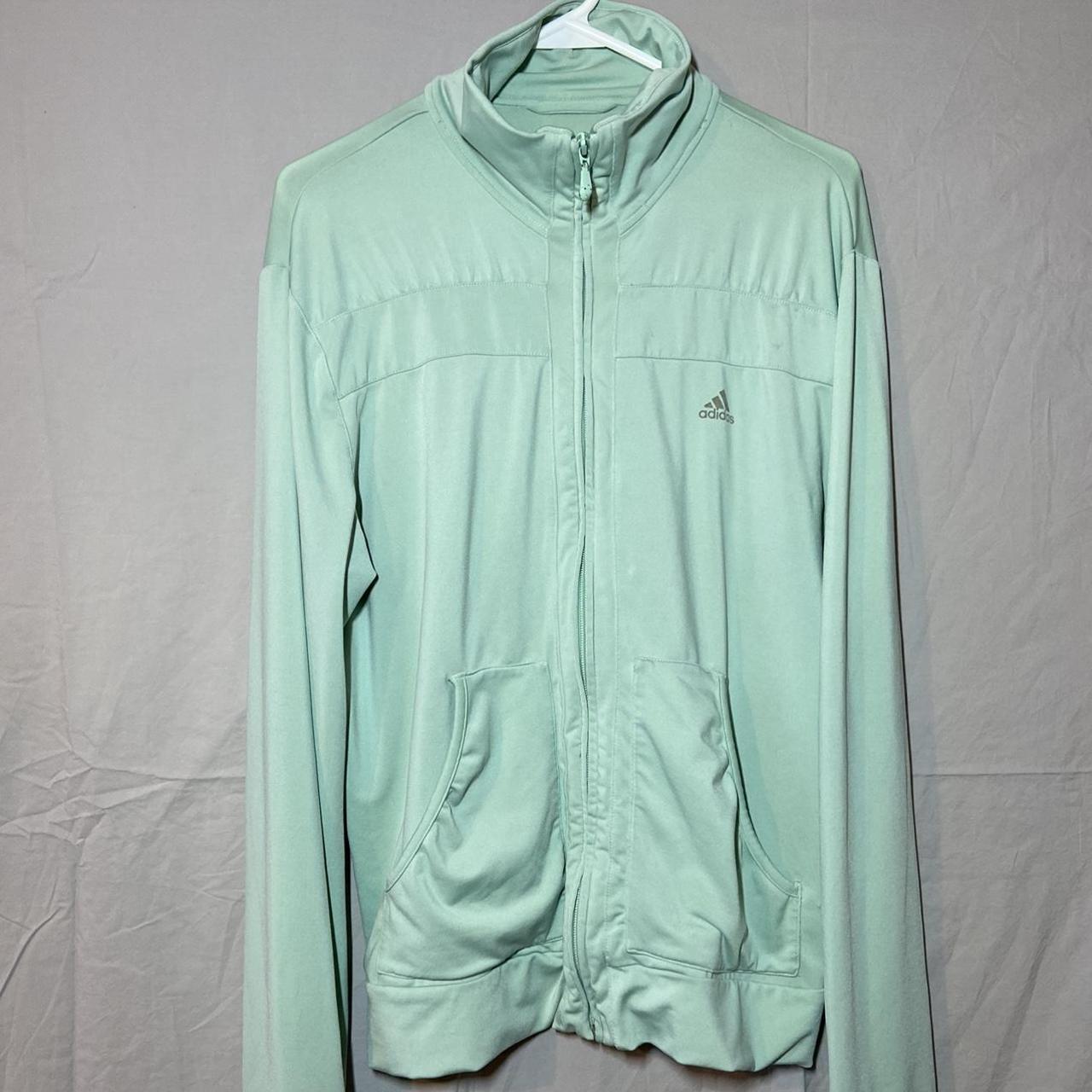 Mint green adidas zip up. Comfortable and elastic... Depop