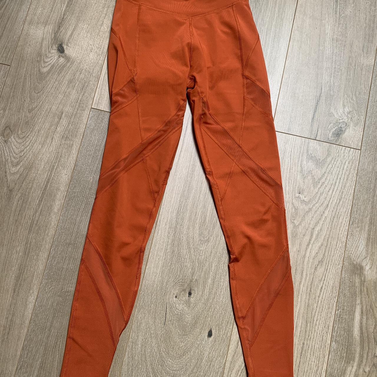 Orange Puma x Pam mesh insert leggings