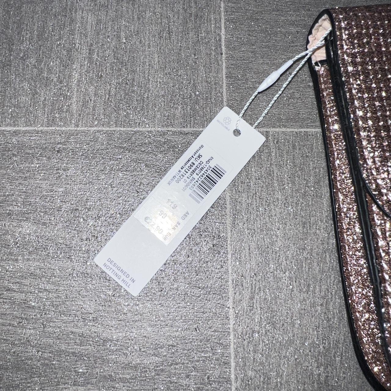 Rose gold glitter Accessorise clutch bag, comes with... Depop