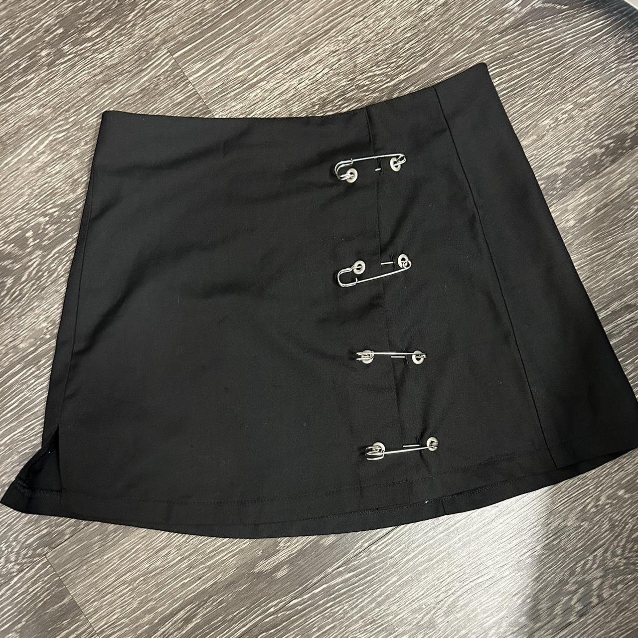 Mini skirt with side slid and oversized safety pin... - Depop