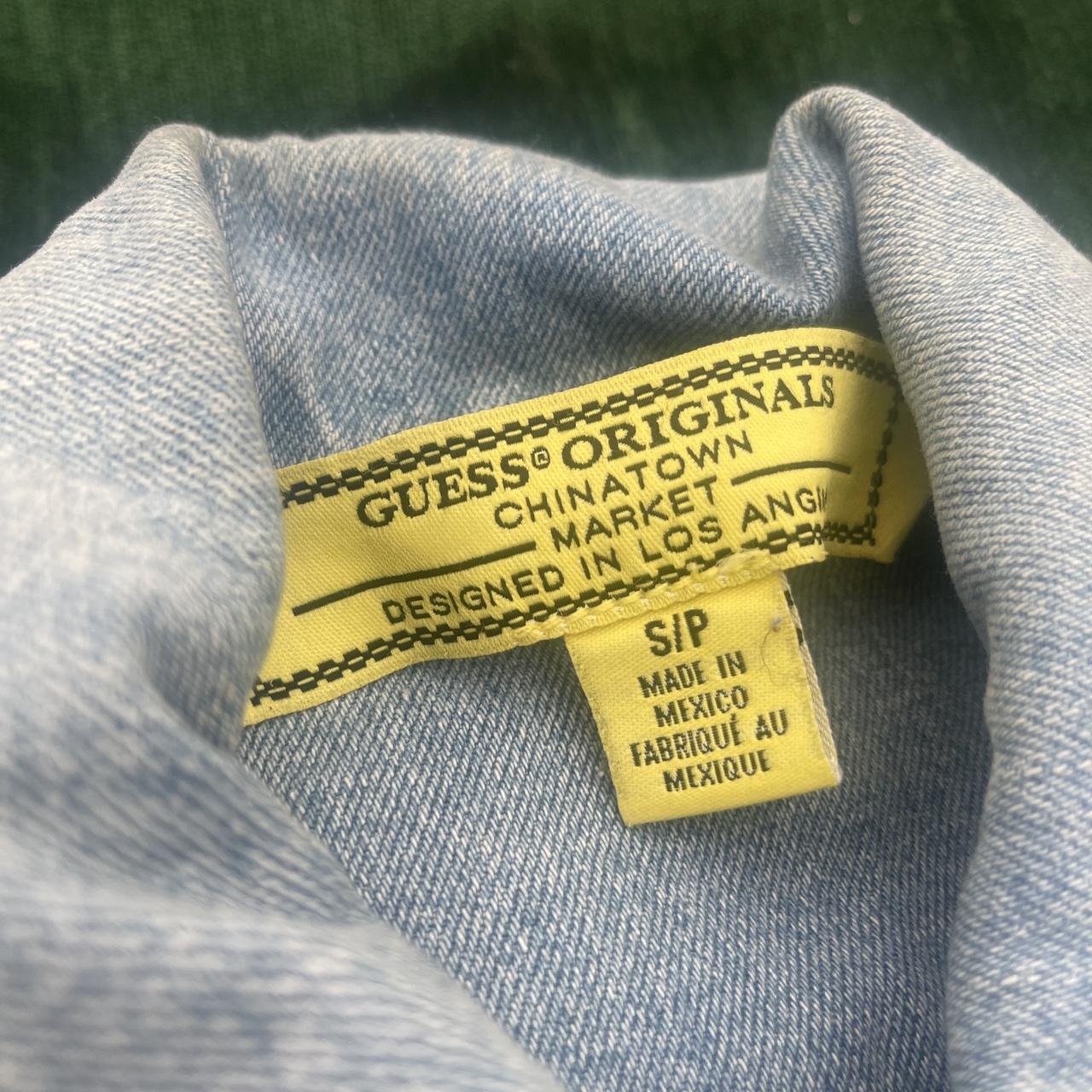 Guess x chinatown market x smiley uo exclusive denim clearance trucker jacket