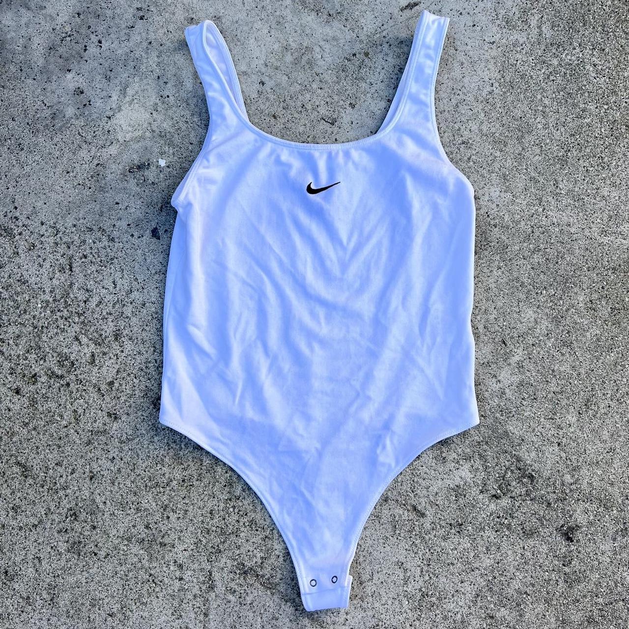White Nike bodysuit Size S Used 9/10 condition Depop