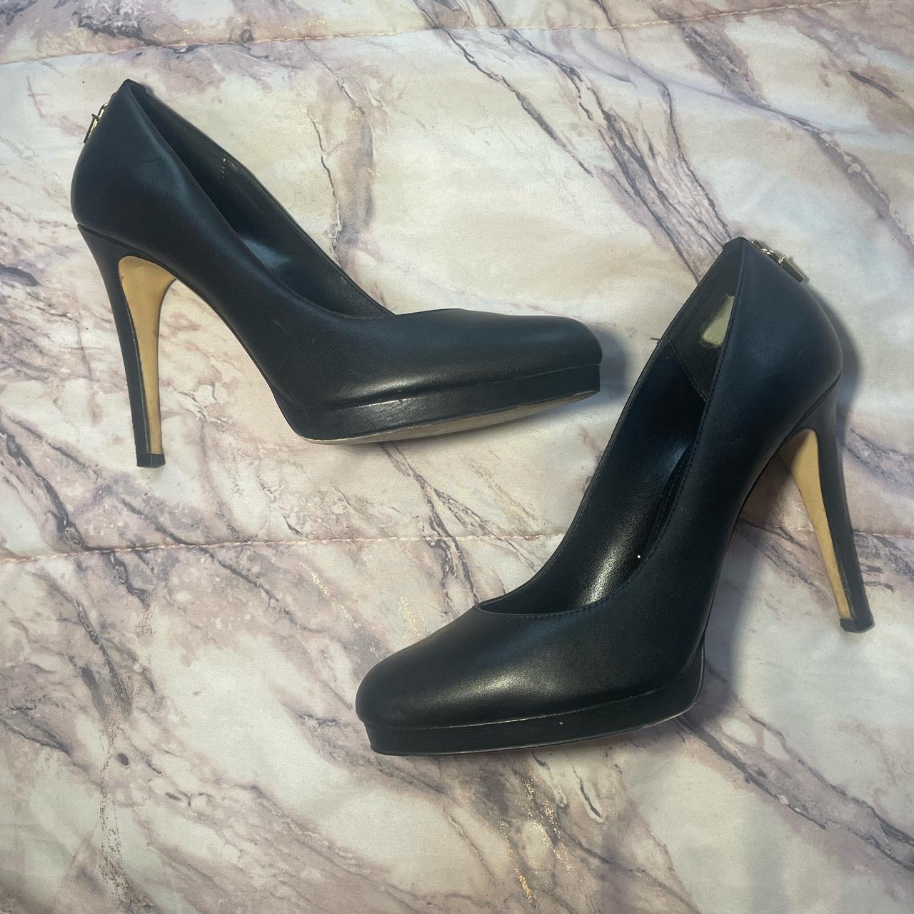 Michael kors black 2024 and gold heels