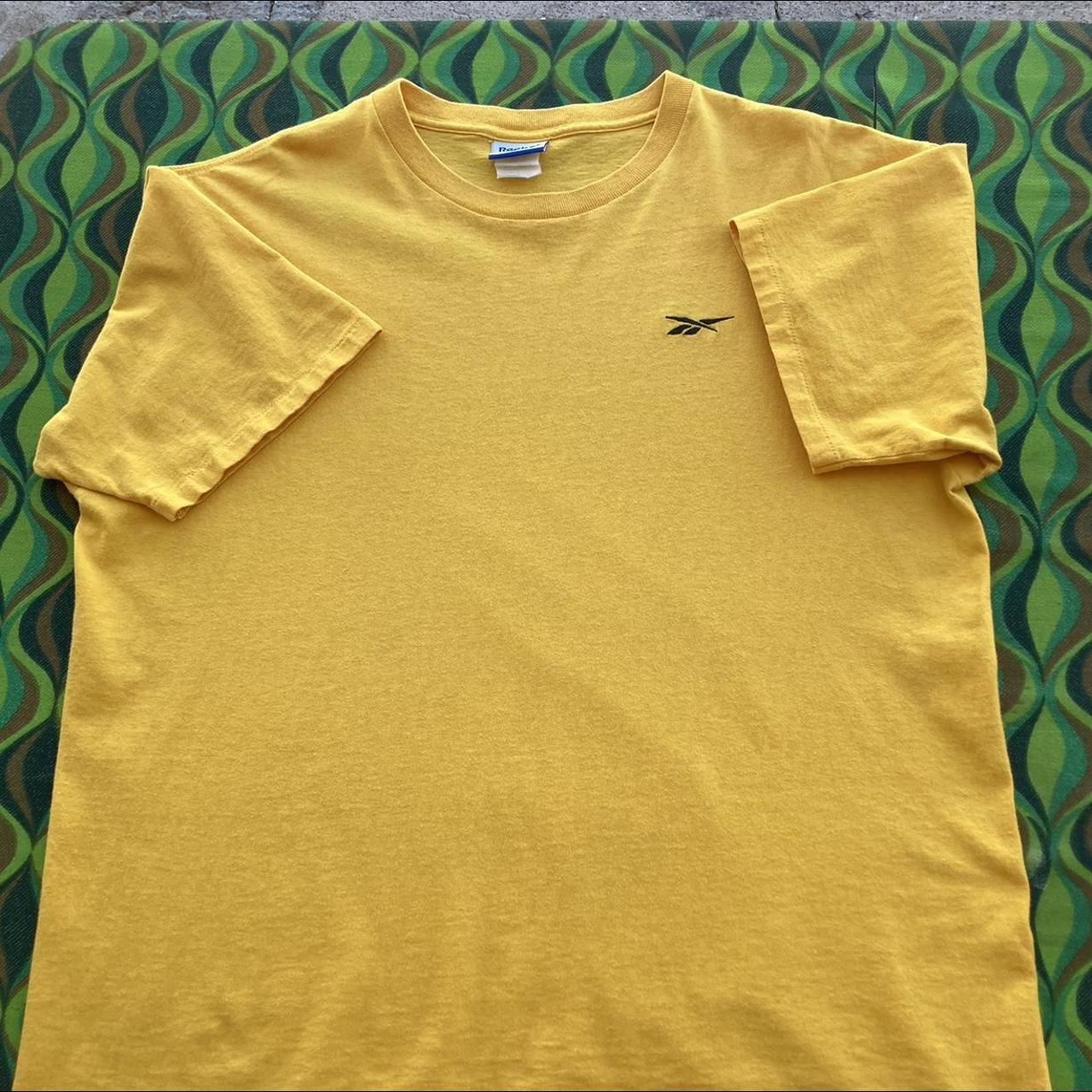 Black and yellow cheap reebok shirt