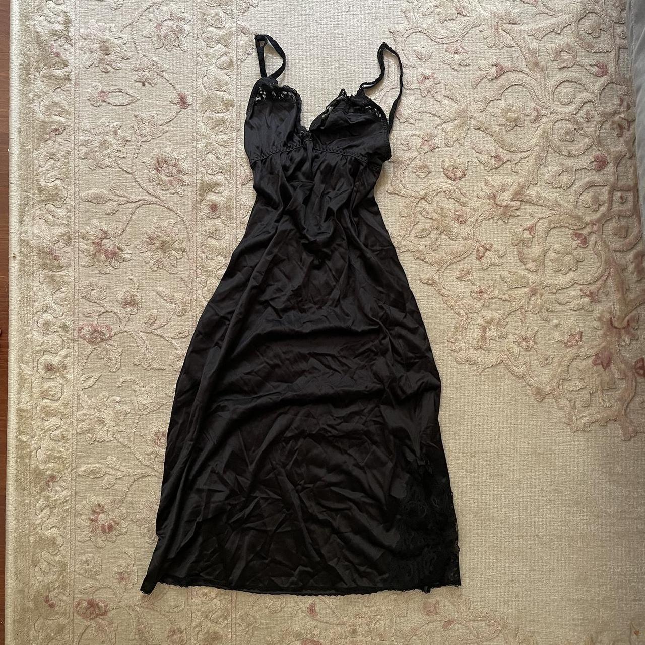 Cute black stain slip. No brand. Would best fit a... - Depop
