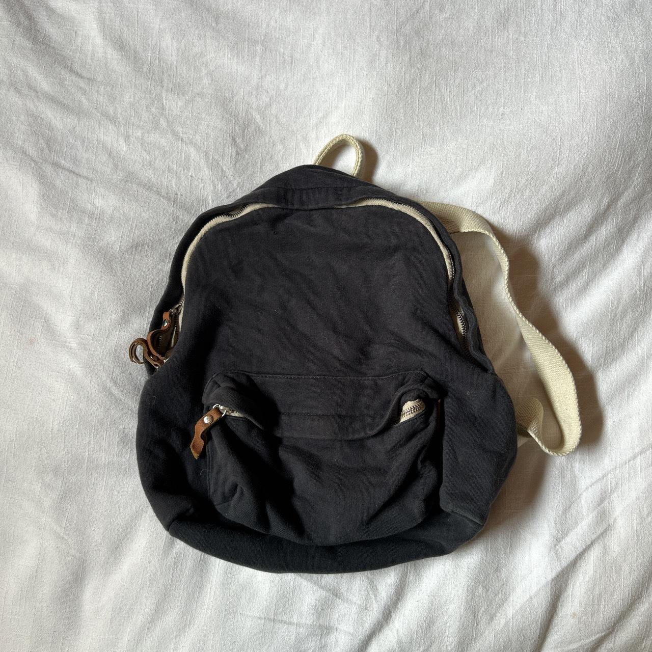 brandy melville navy mini backpack only flaw is... Depop
