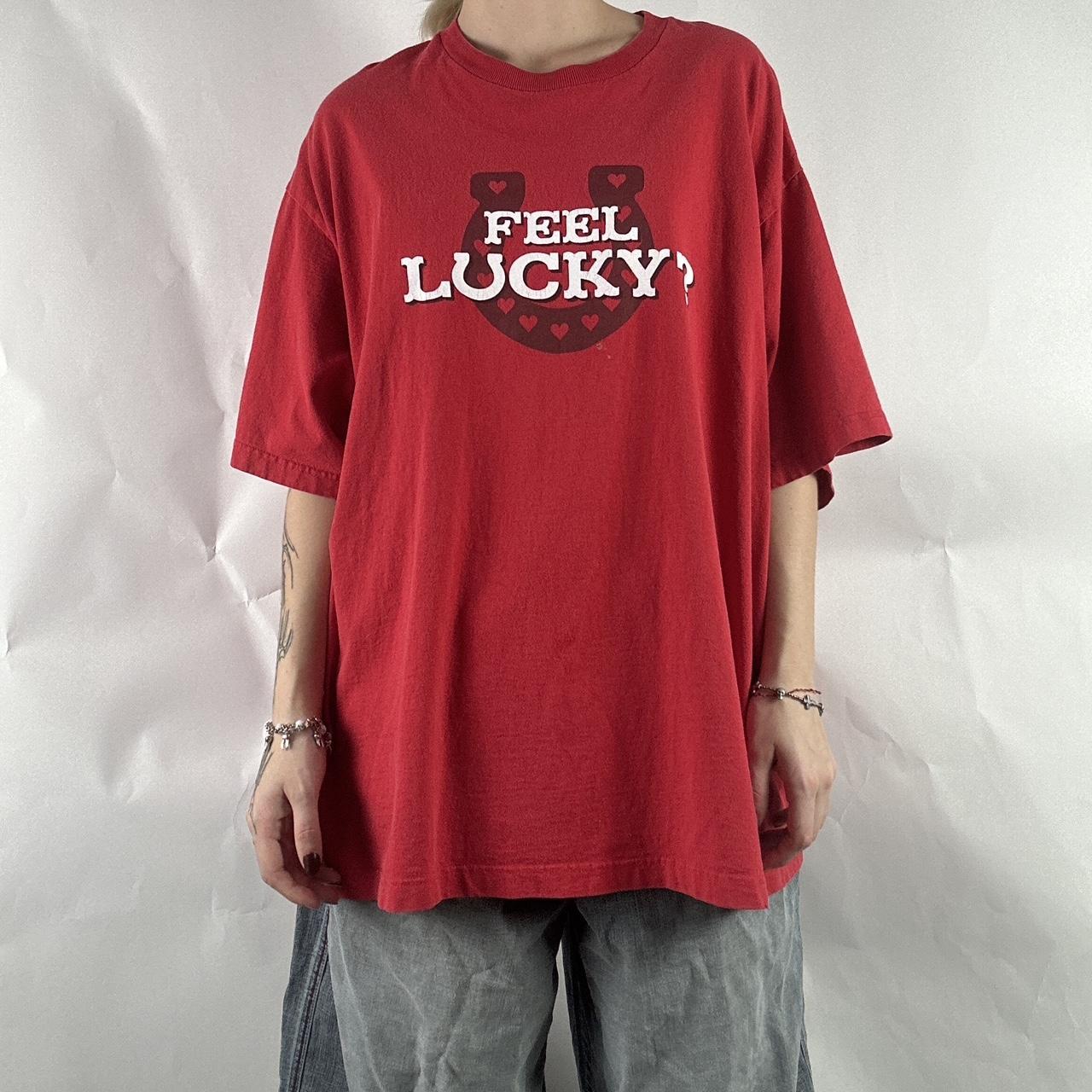 red Feeling Lucky? shirt. tag is ripped off but can... - Depop