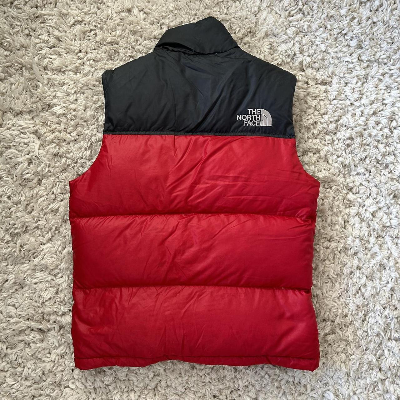 North face red store gilet