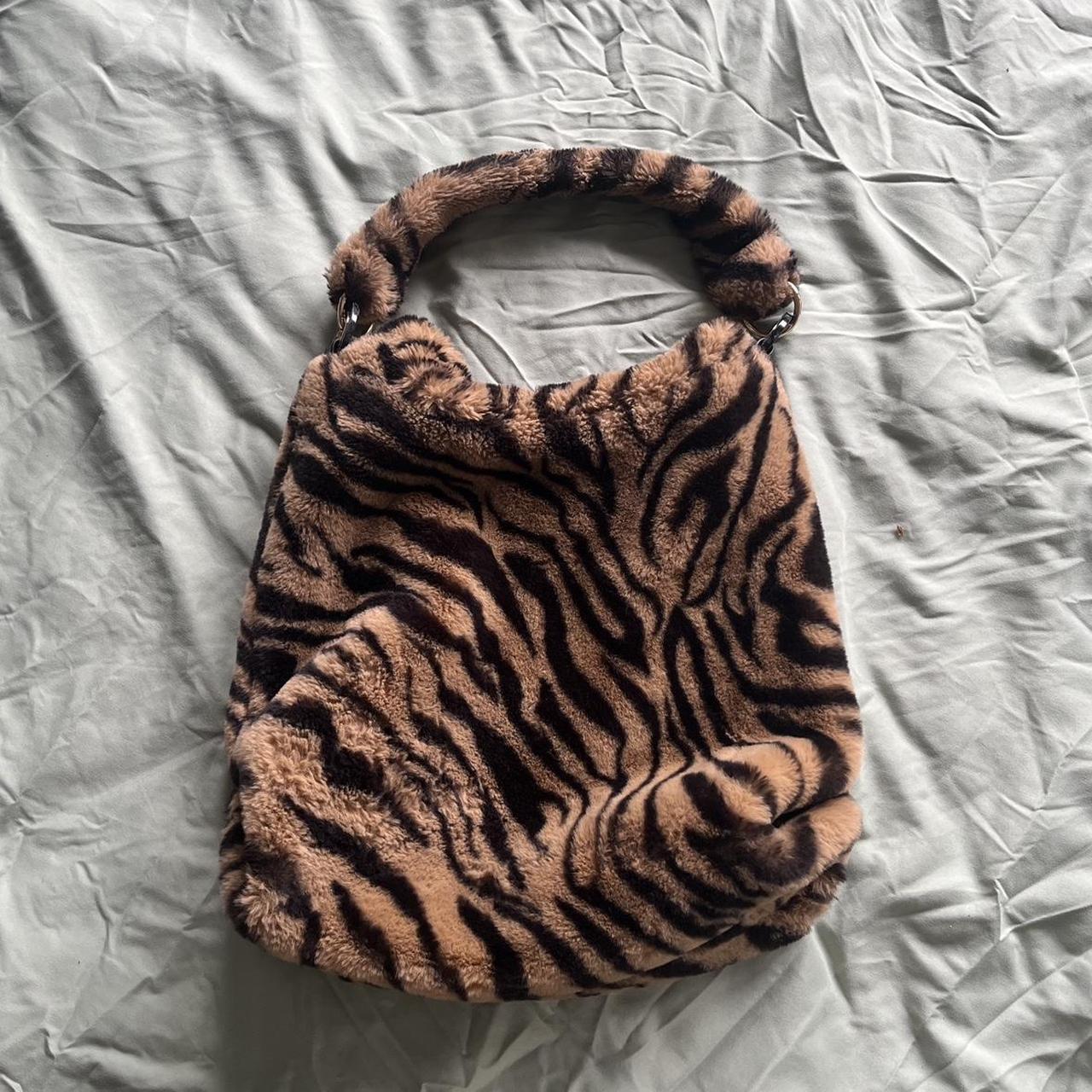 Topshop faux fur bag in tiger print still in. Depop