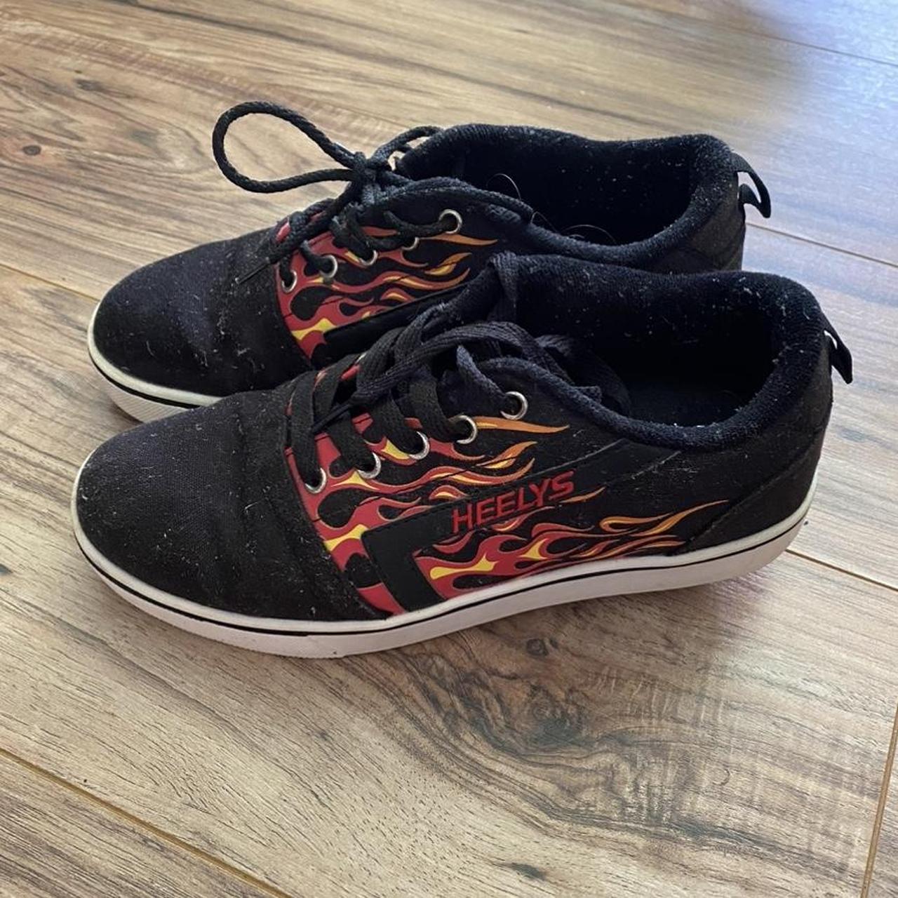 Heelys Men's Black and Orange Trainers | Depop