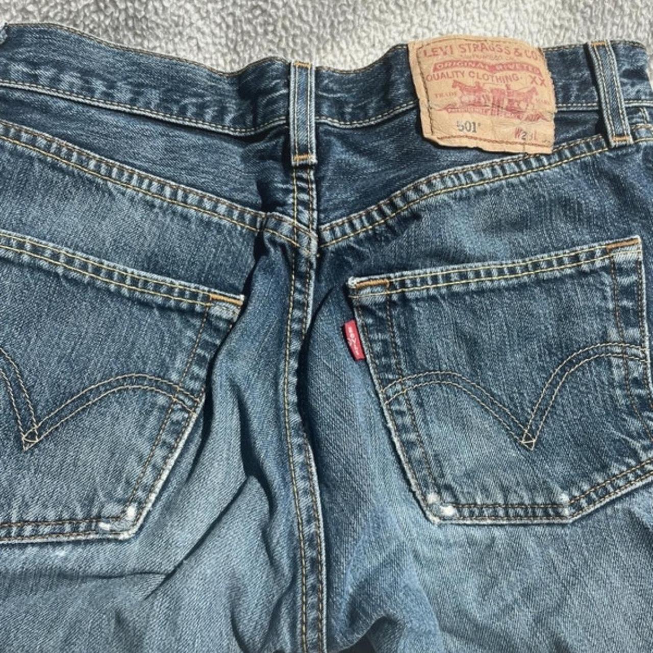 Blue denim Levi’s shorts with side slit #levis... - Depop