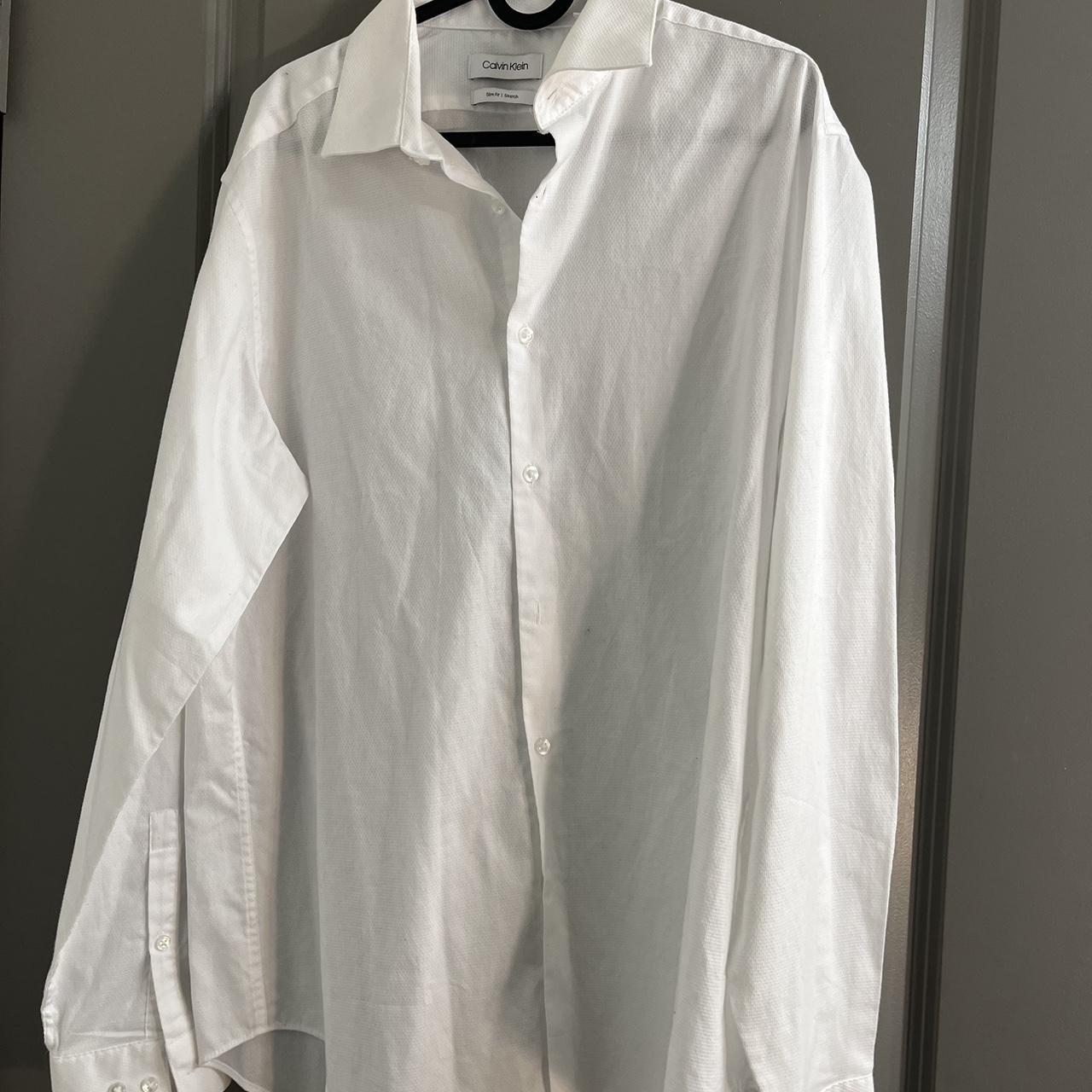 White Calvin Klein long sleeve button-down... - Depop