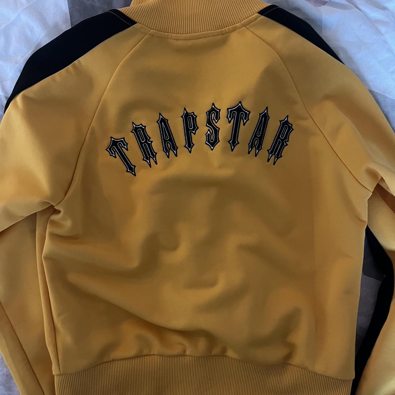 Trapstar yellow and black zip up Only worn once in... Depop