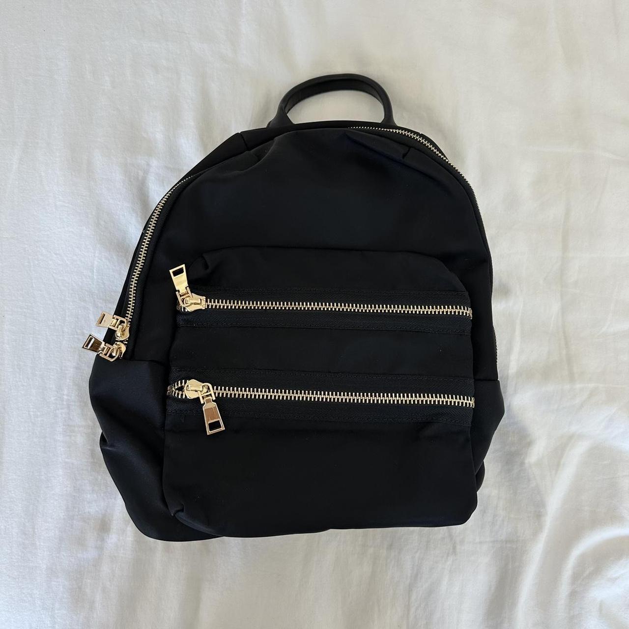 Small black backpack with gold hardware 4 zipper. Depop