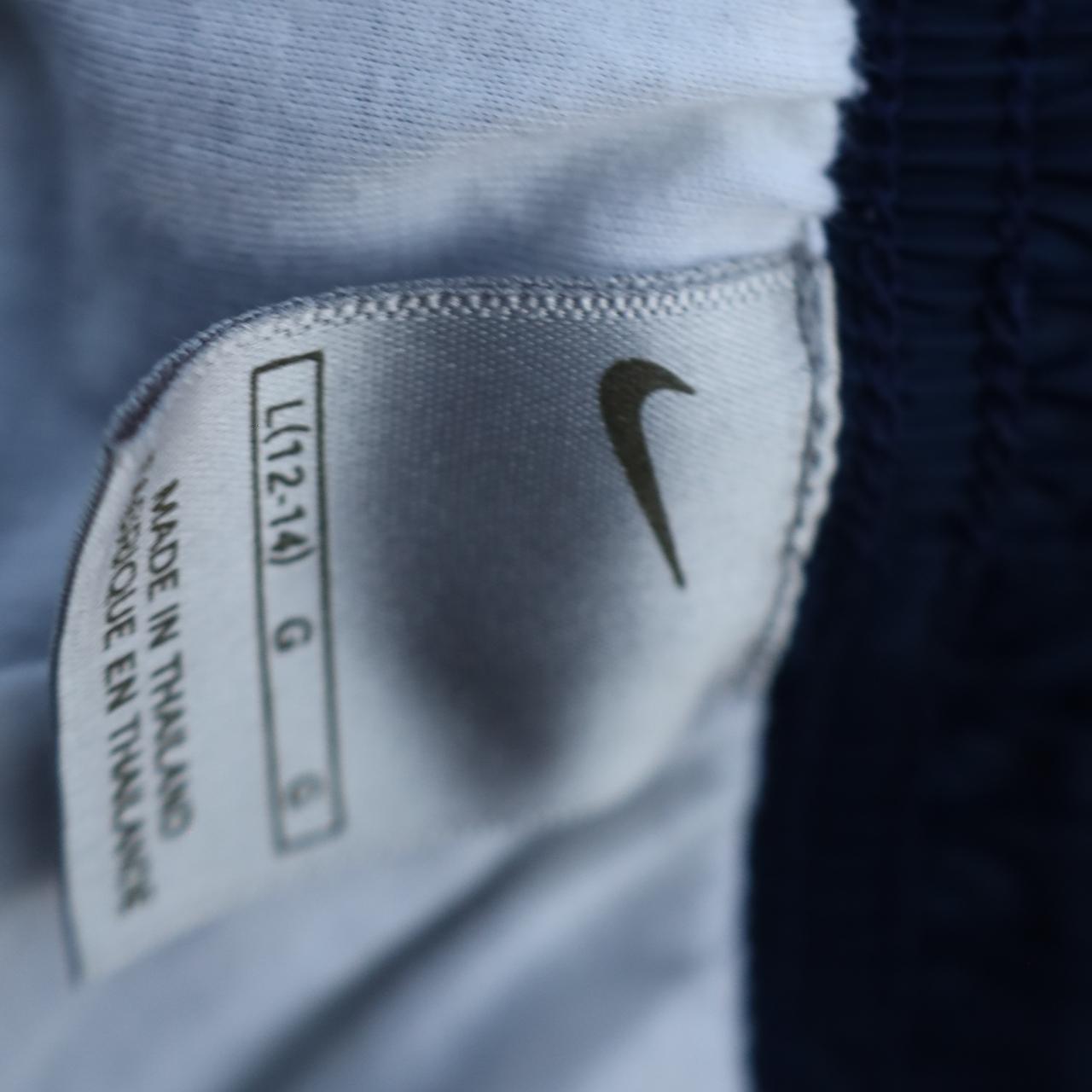 mens nike swishy pants